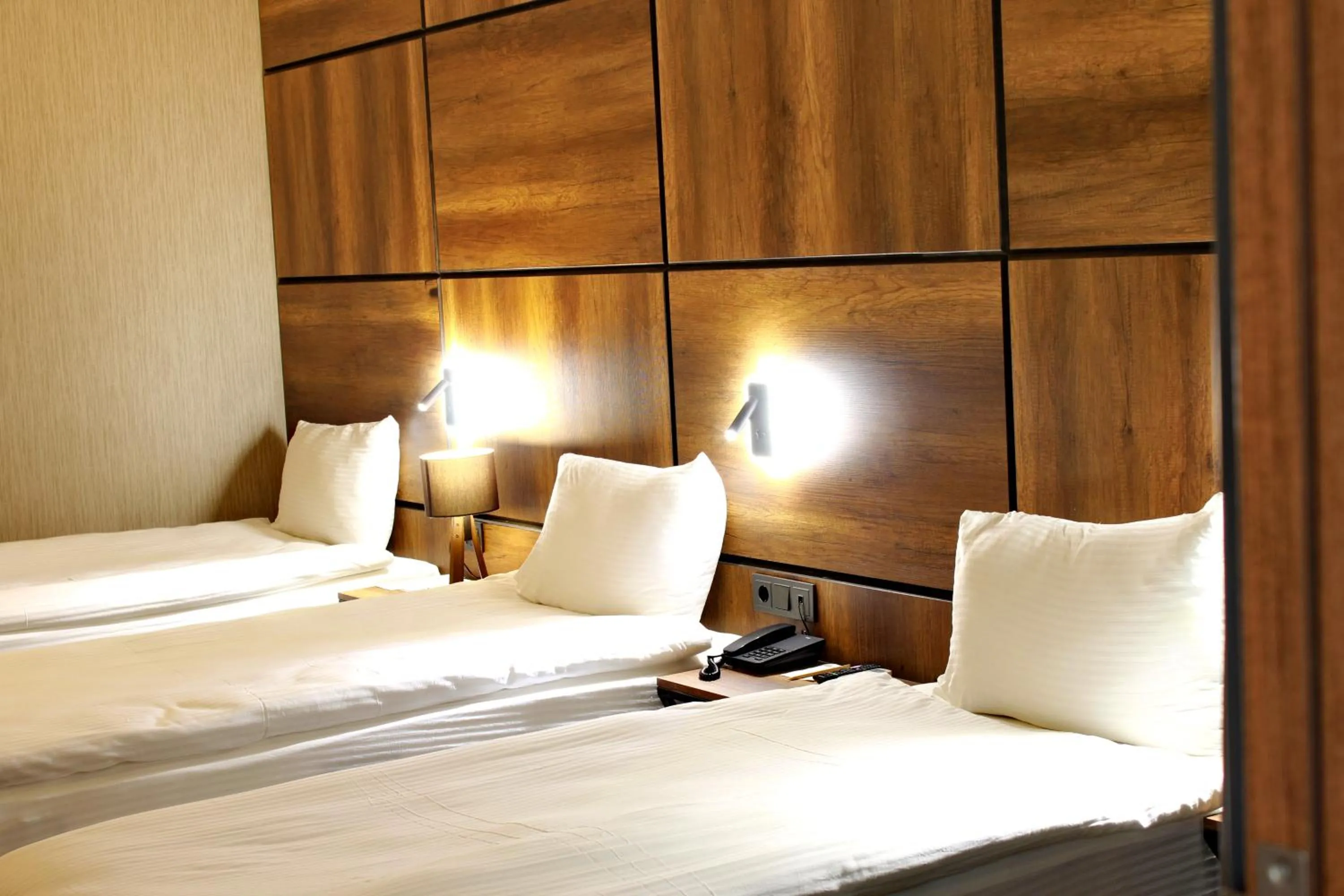 Bed in Mardiva Hotel