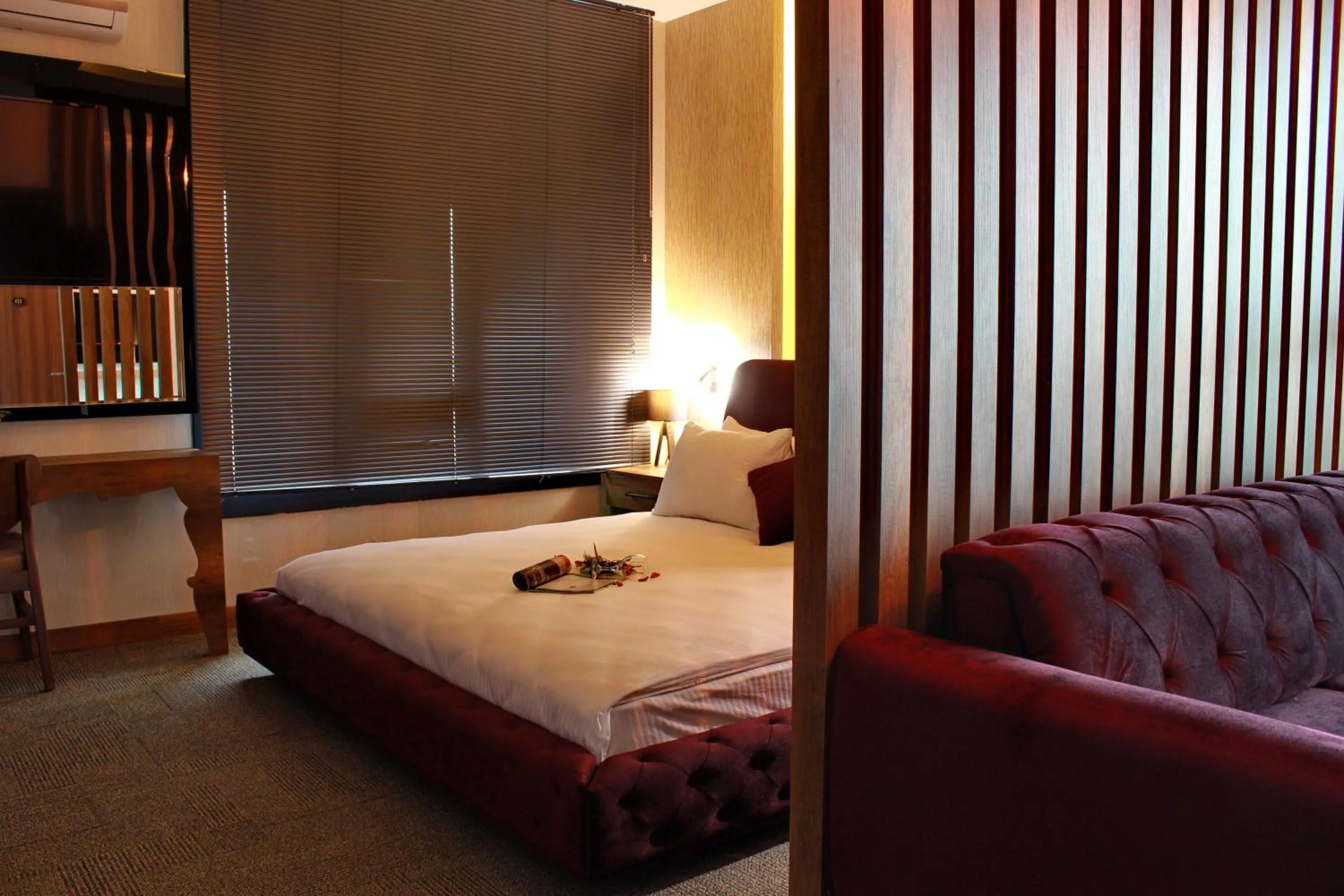 Bed in Mardiva Hotel
