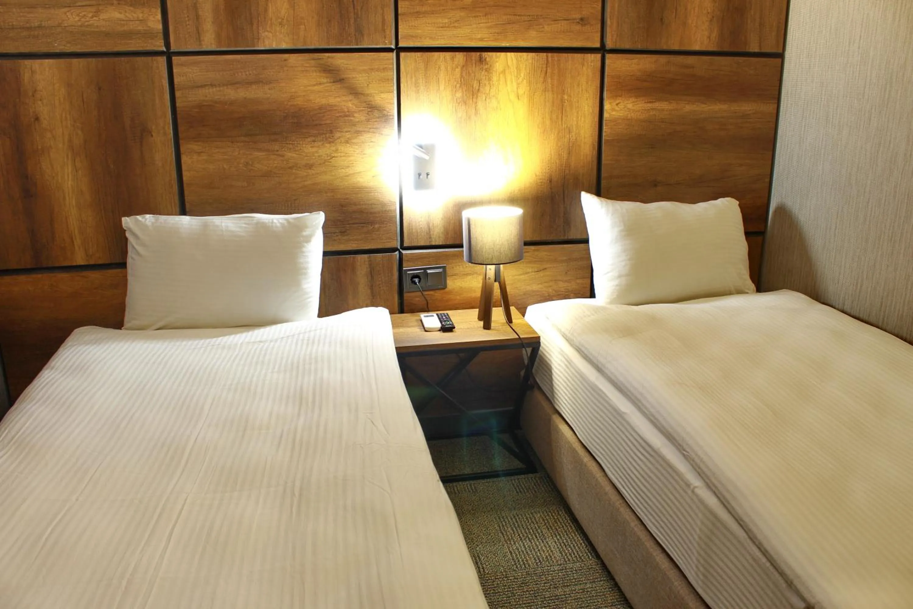 Bed in Mardiva Hotel