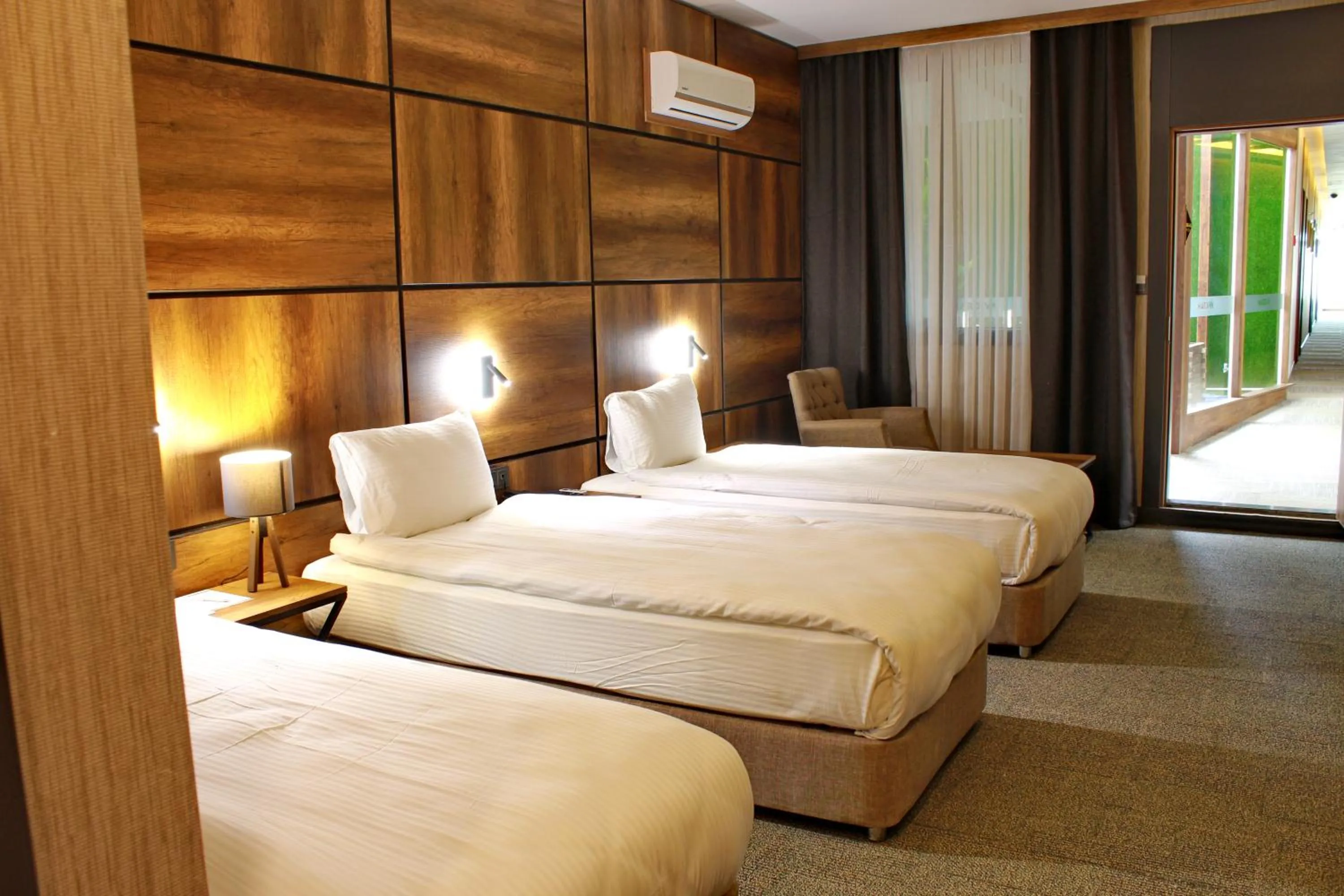 Bed in Mardiva Hotel