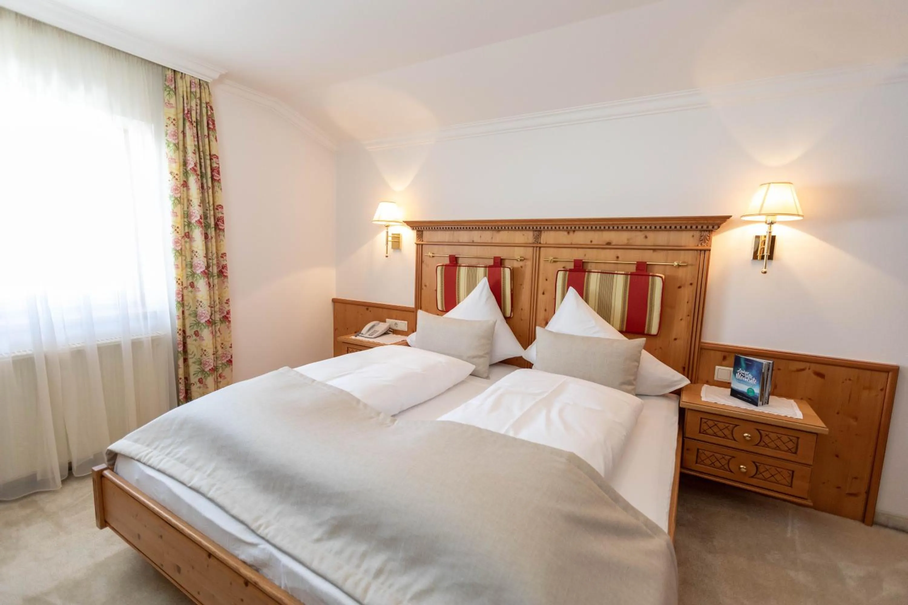 Photo of the whole room, Bed in Alpines Gourmet Hotel Montanara