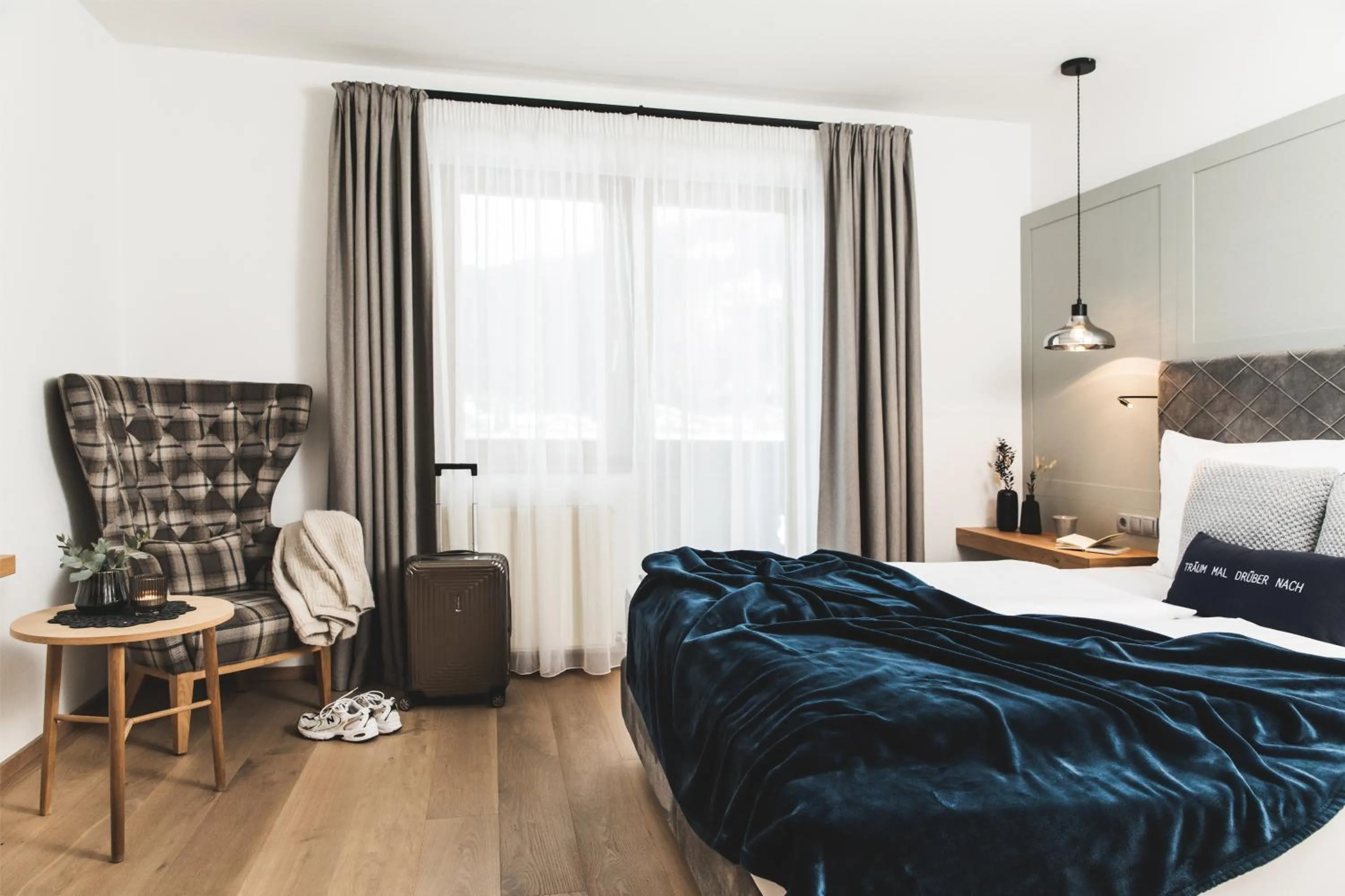 Photo of the whole room, Bed in Alpines Gourmet Hotel Montanara