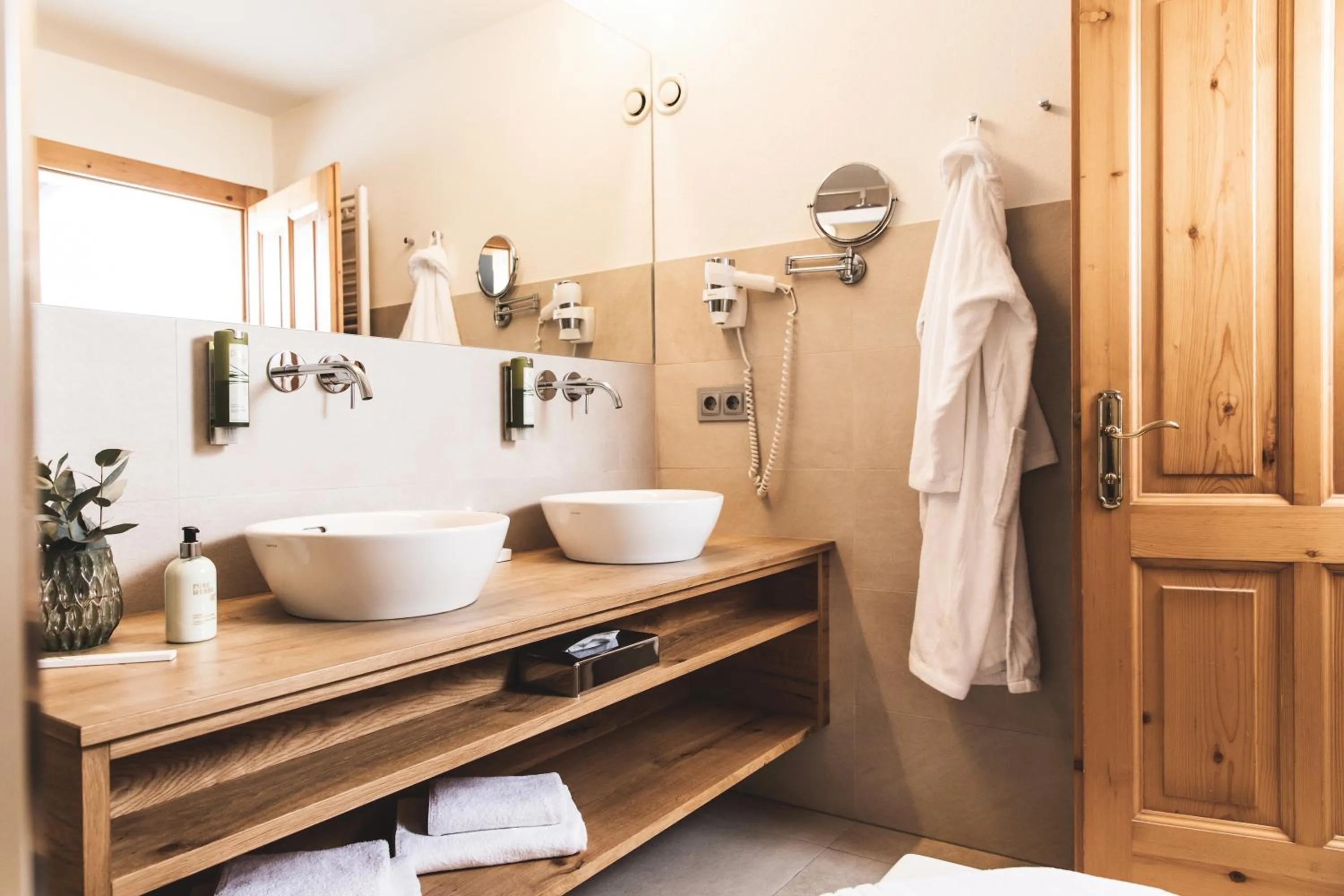 Bathroom in Alpines Gourmet Hotel Montanara