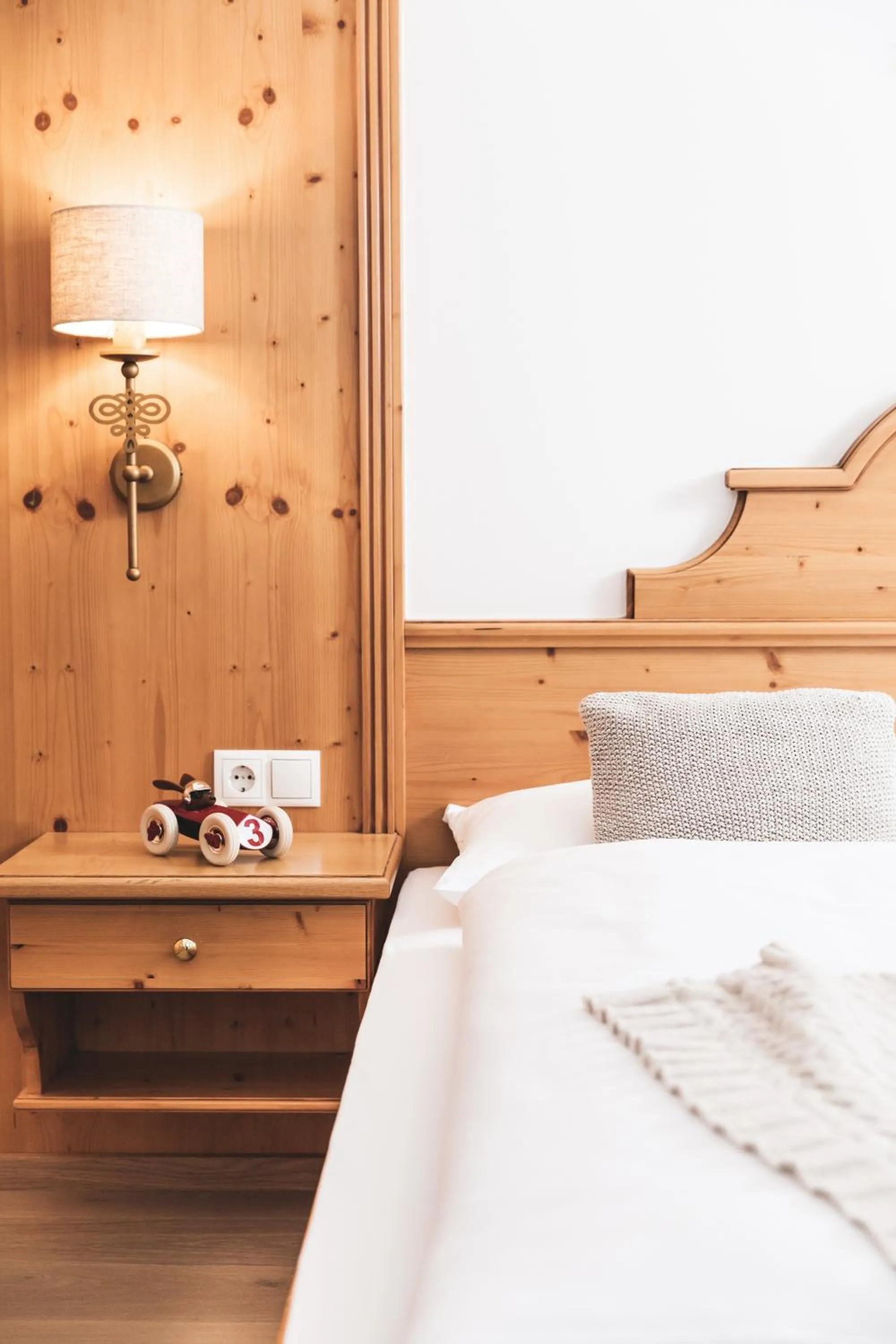 Photo of the whole room, Bed in Alpines Gourmet Hotel Montanara