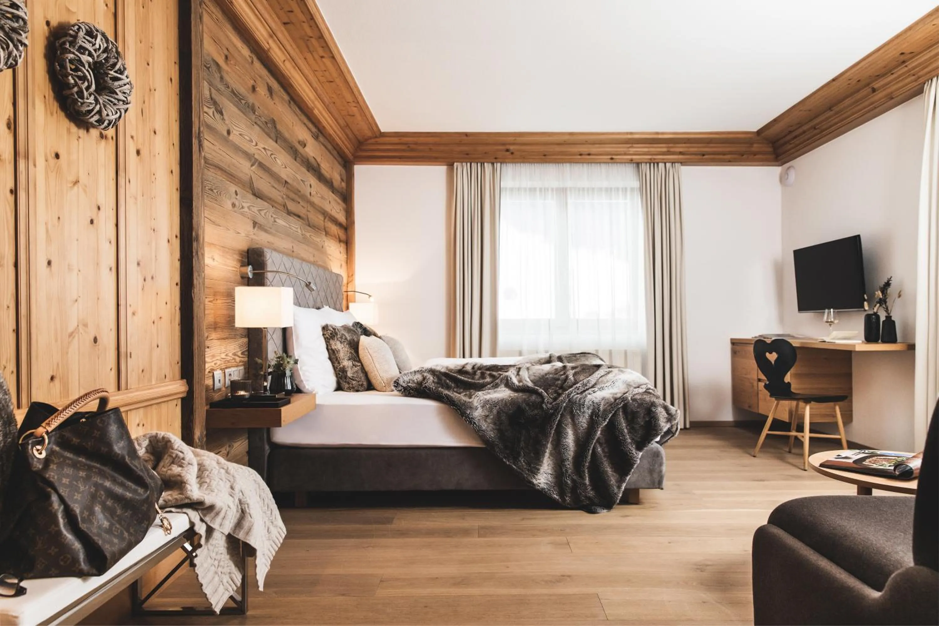 Photo of the whole room, Bed in Alpines Gourmet Hotel Montanara
