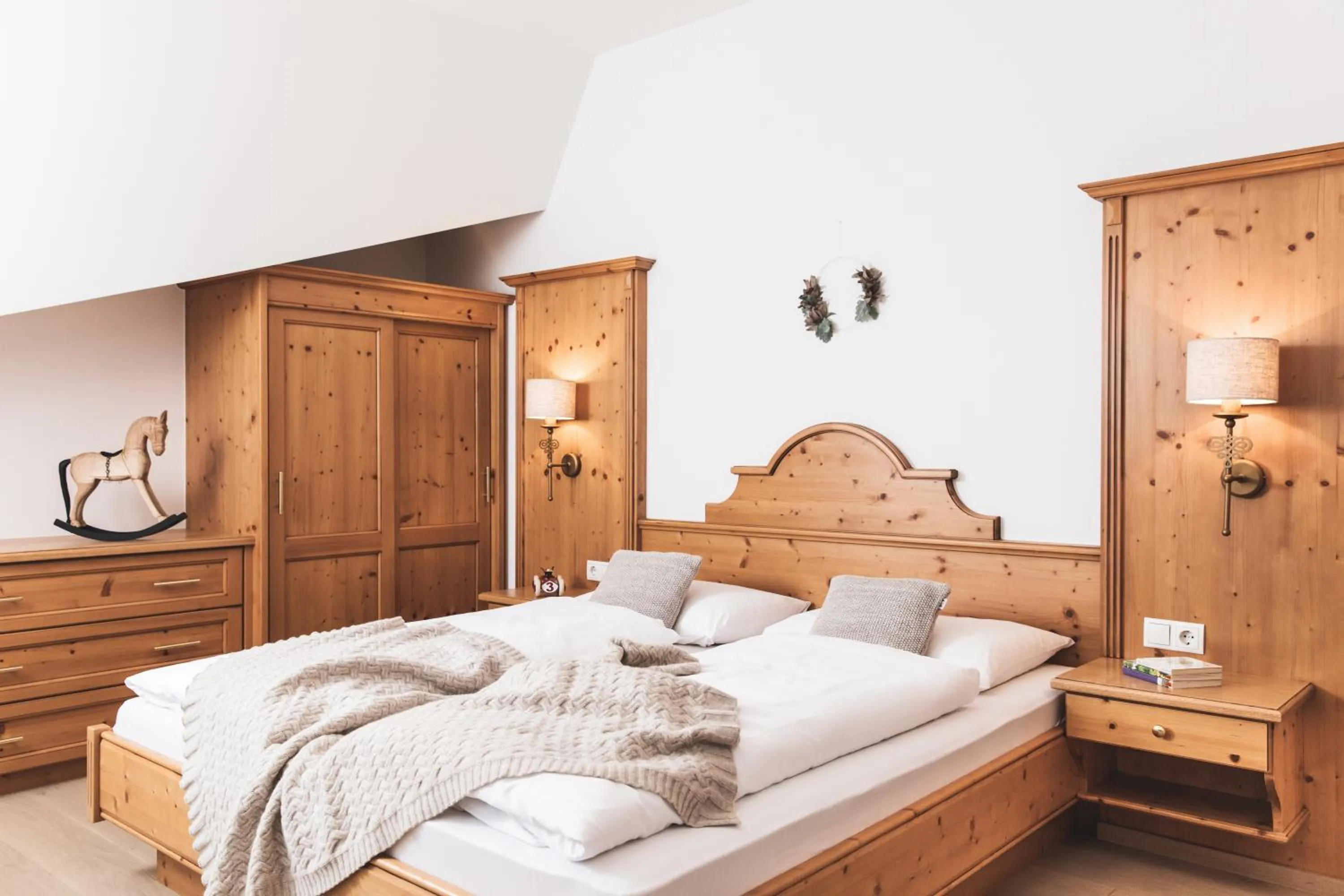 Photo of the whole room, Bed in Alpines Gourmet Hotel Montanara