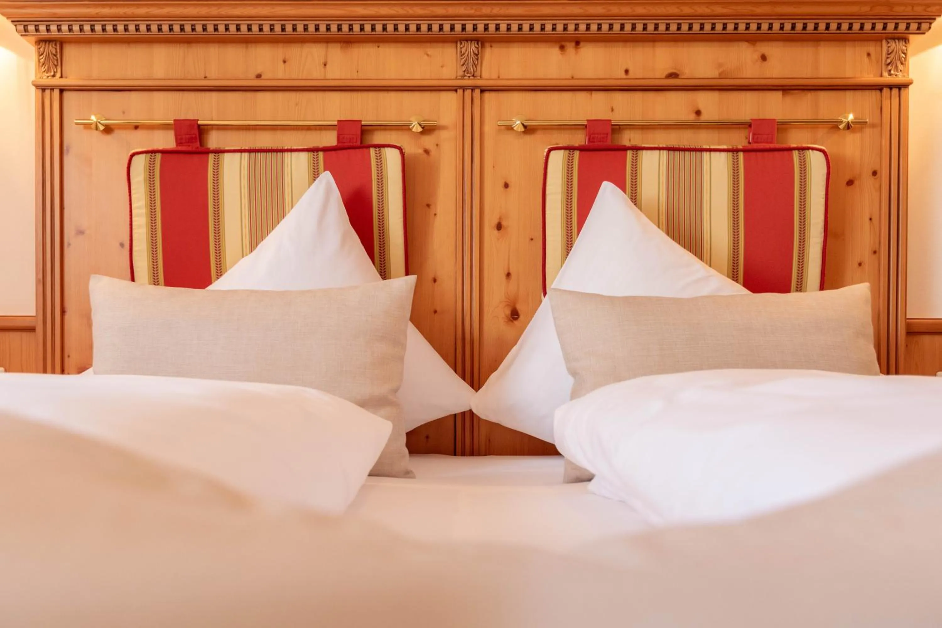 Photo of the whole room, Bed in Alpines Gourmet Hotel Montanara
