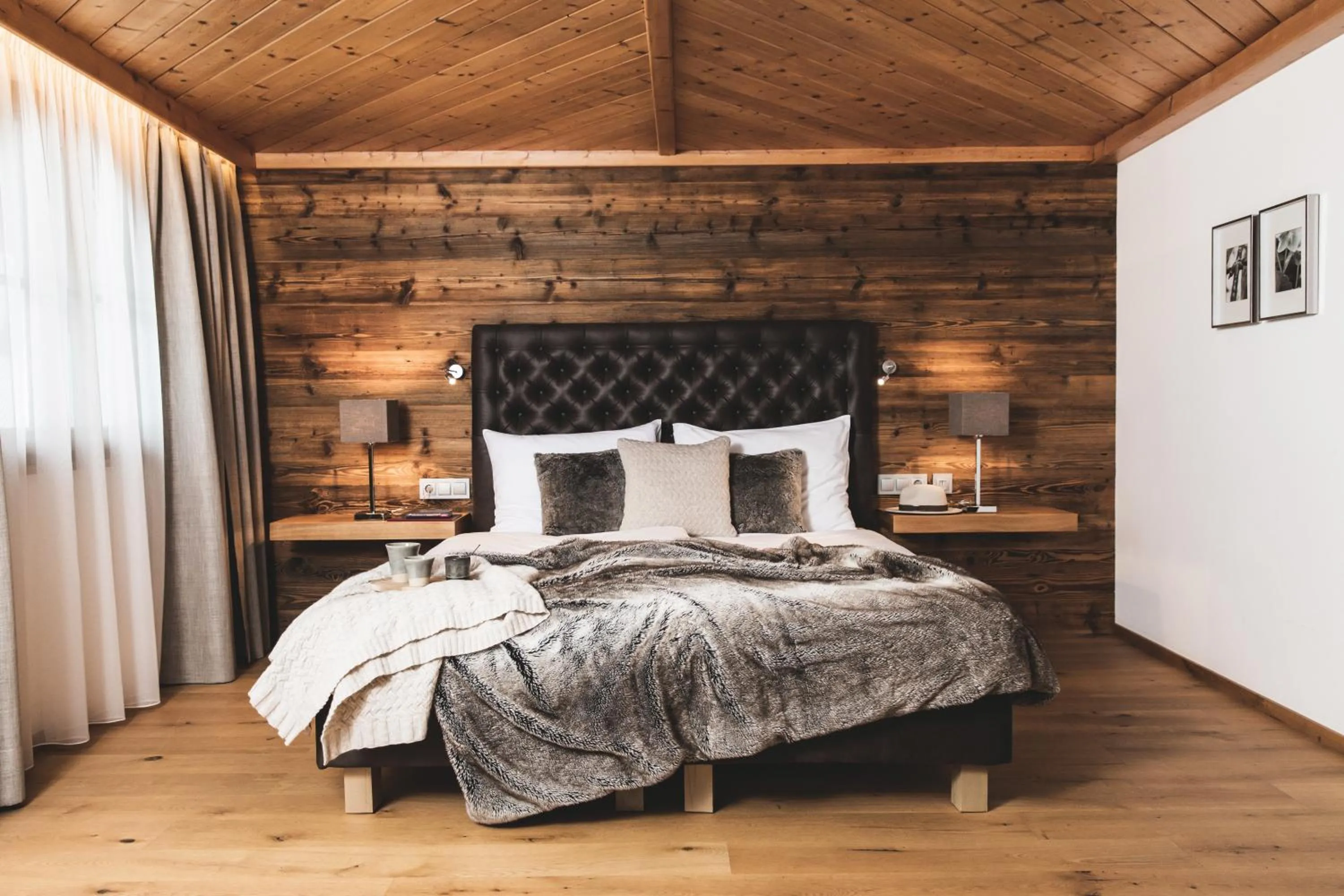 Photo of the whole room, Bed in Alpines Gourmet Hotel Montanara