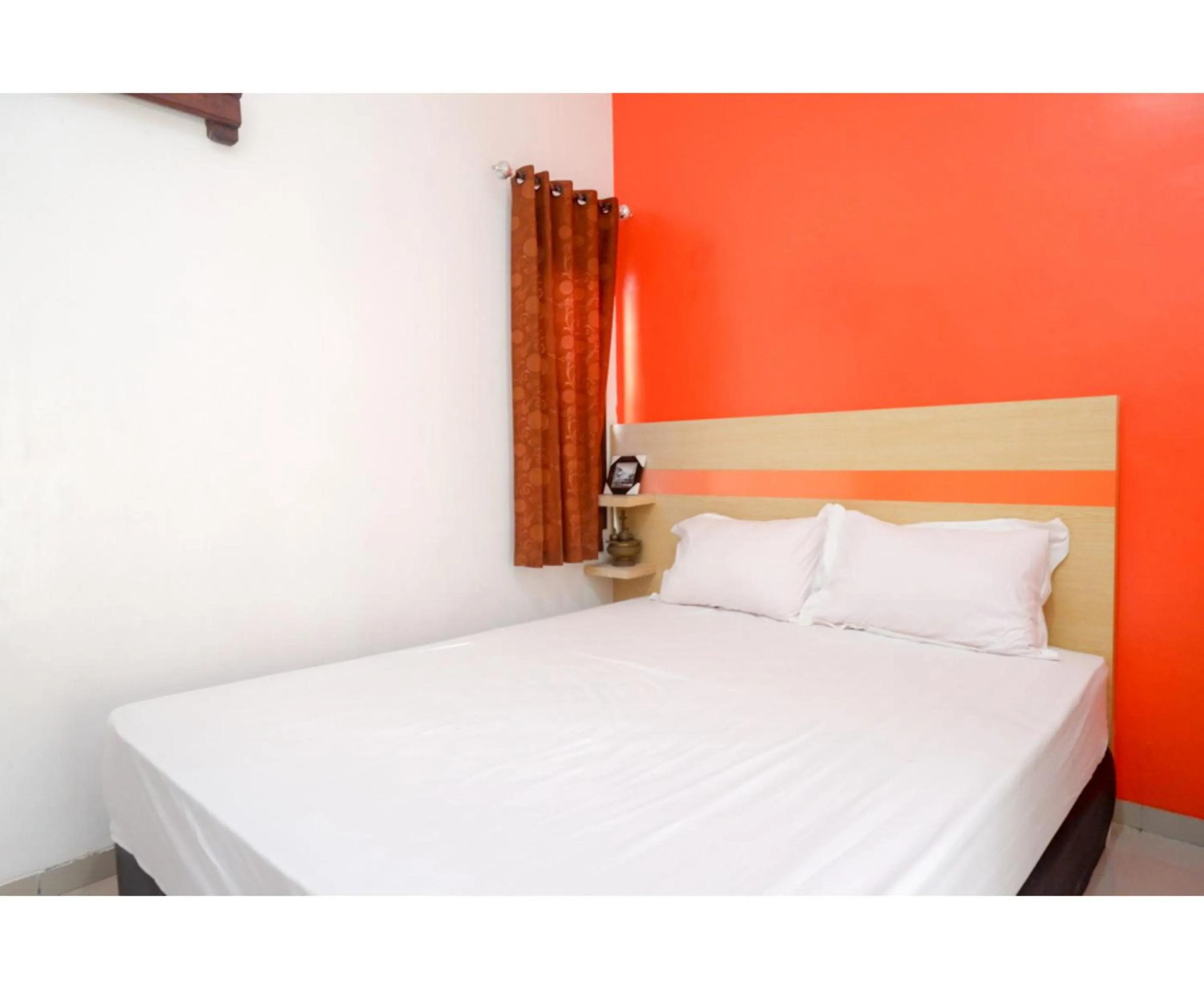 Bed in RedDoorz Syariah near Alun Alun Kota Rembang