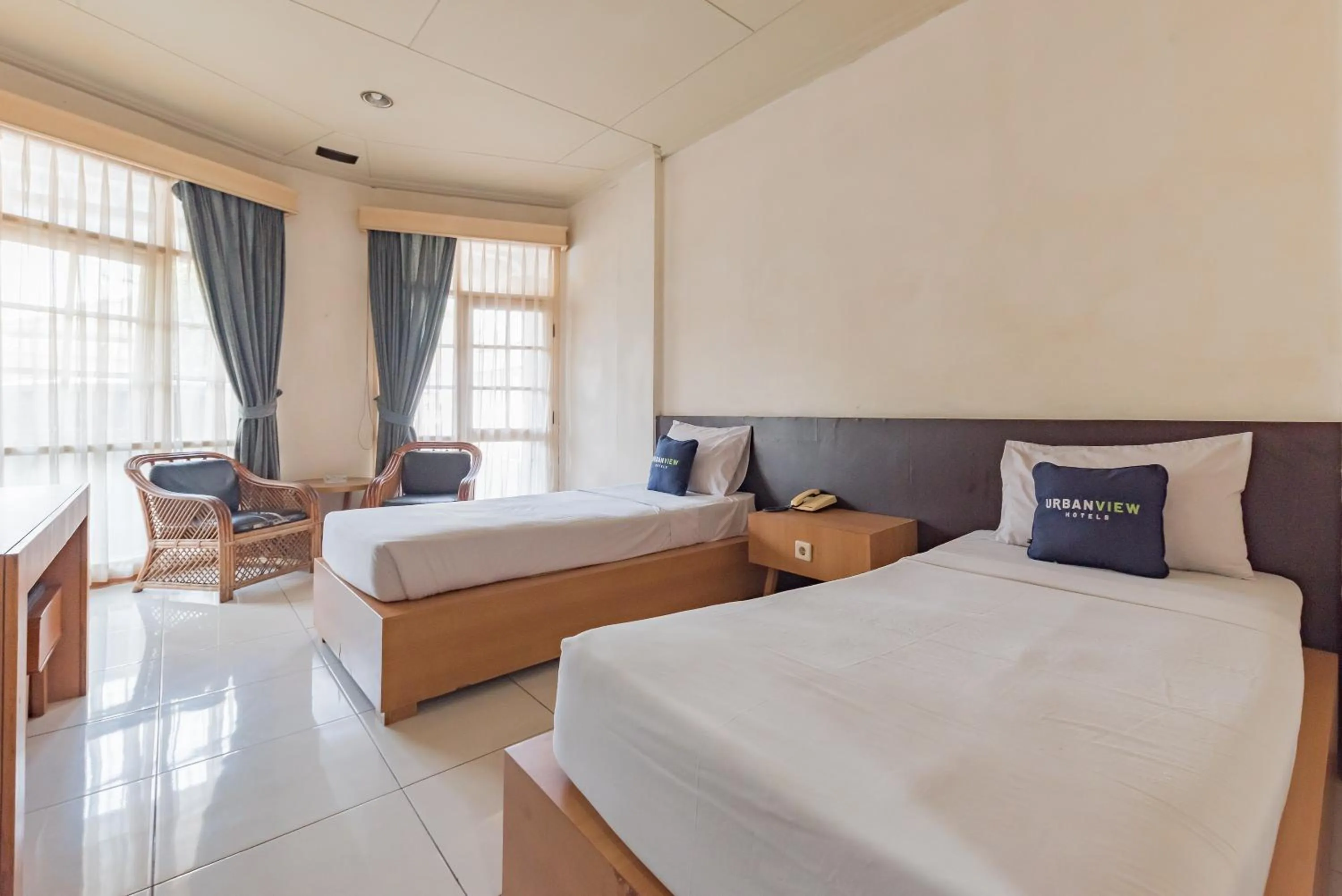 Bedroom, Bed in Urbanview Hotel Crown Tasikmalaya by RedDoorz