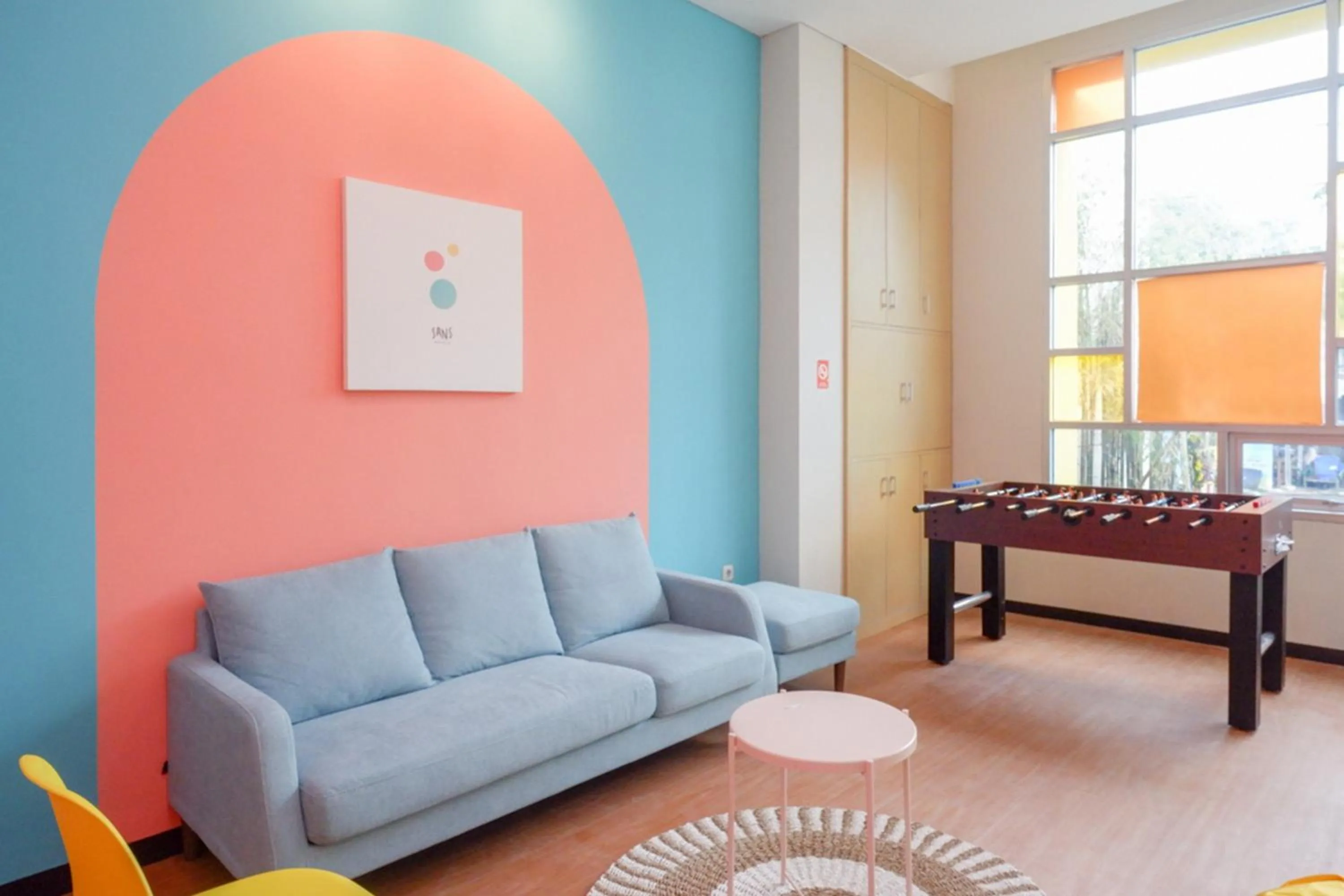 Seating area in Sans Hotel Good Wish Semarang