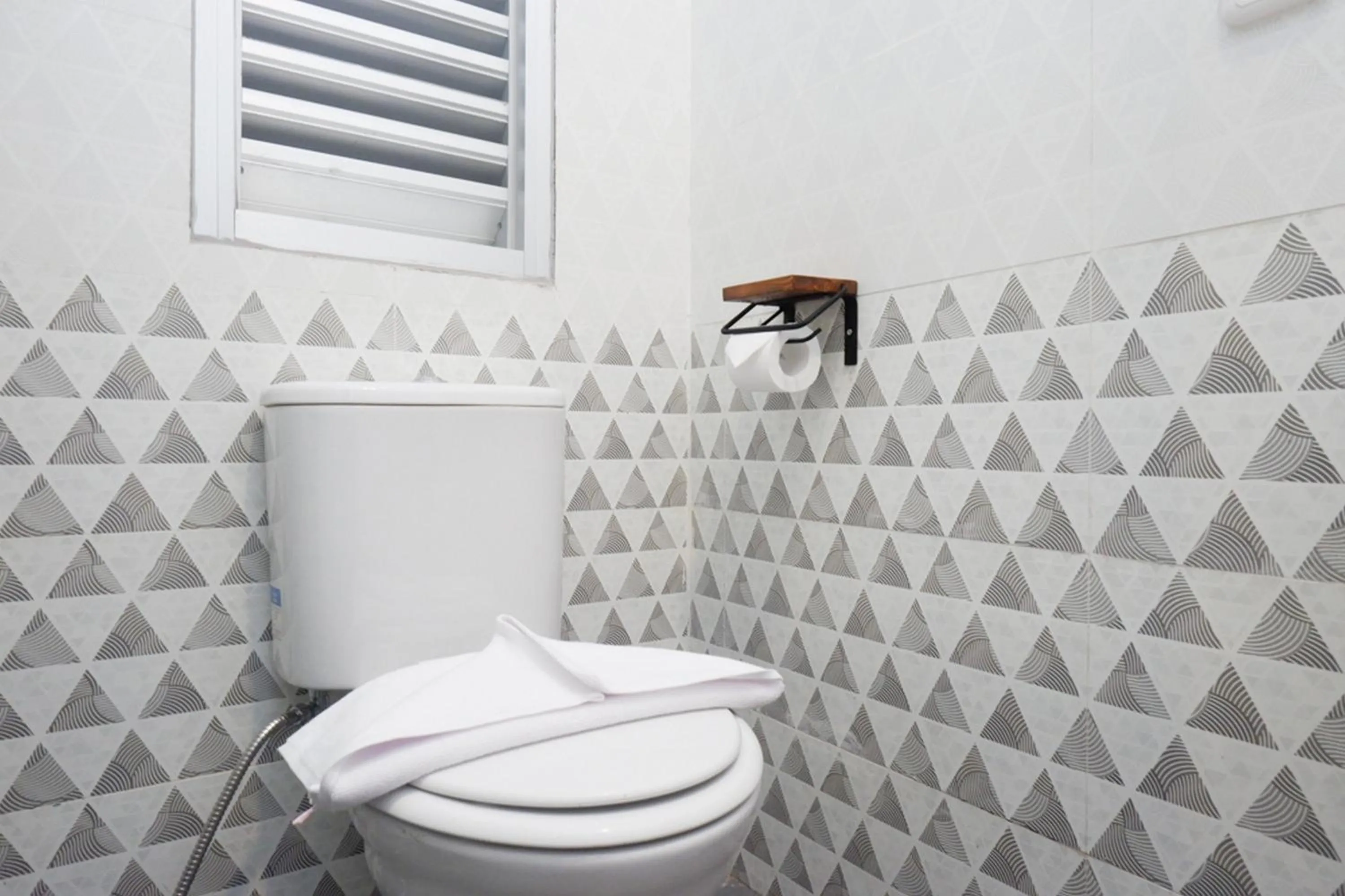 Bathroom in Sans Hotel Good Wish Semarang