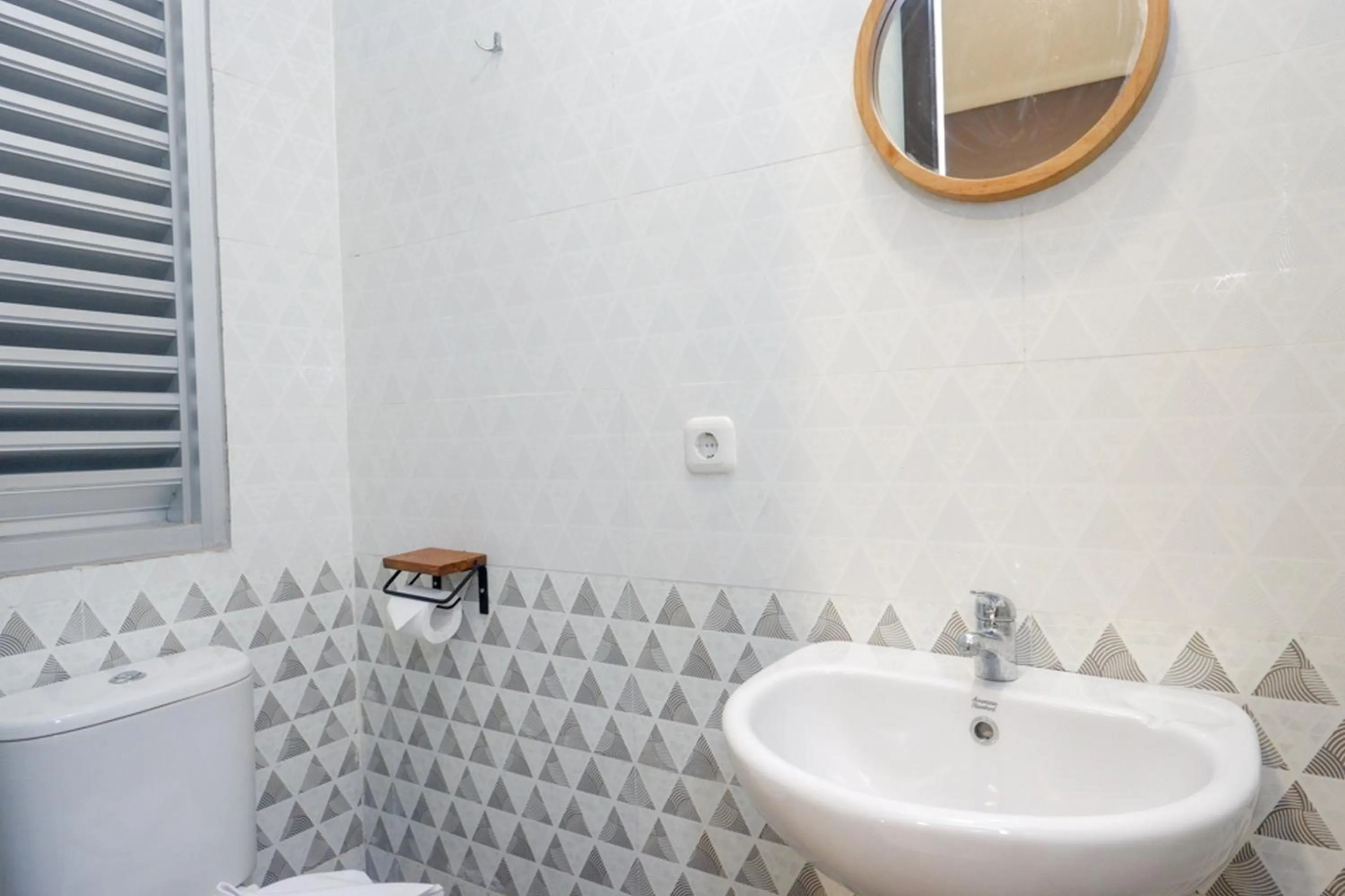 Bathroom in Sans Hotel Good Wish Semarang