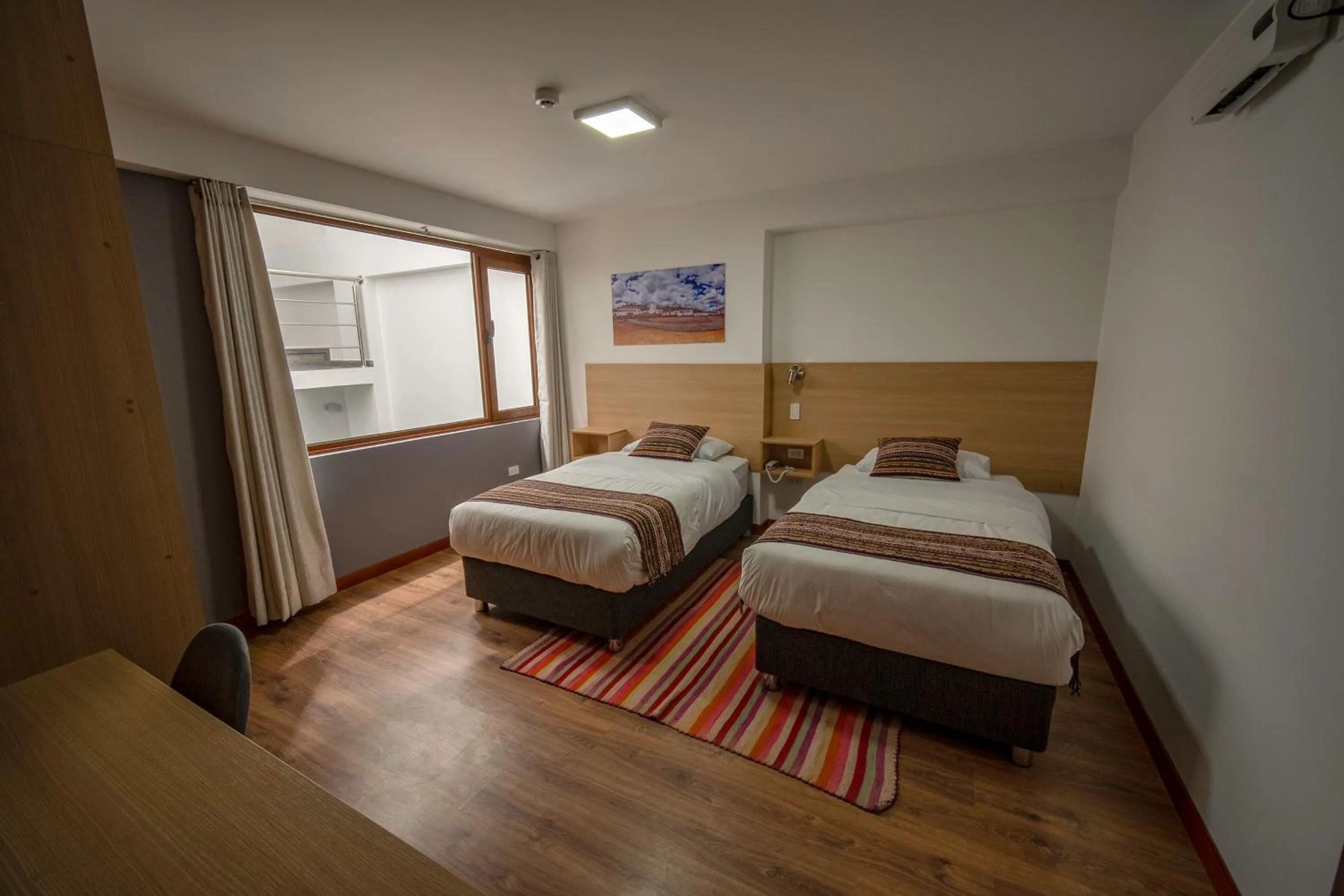 Photo of the whole room, Bed in Ayni Cusco Hotel