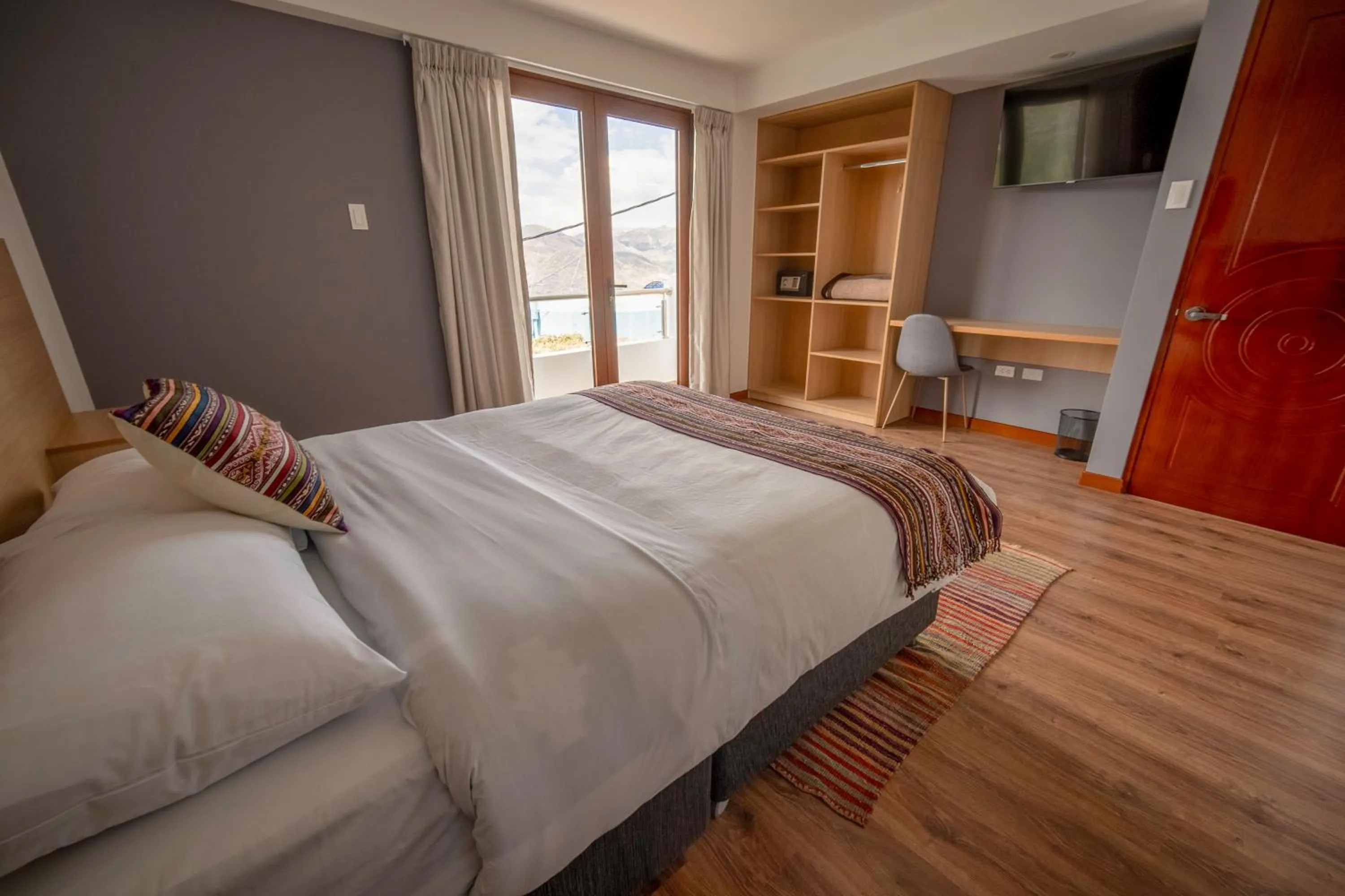 Photo of the whole room, Bed in Ayni Cusco Hotel