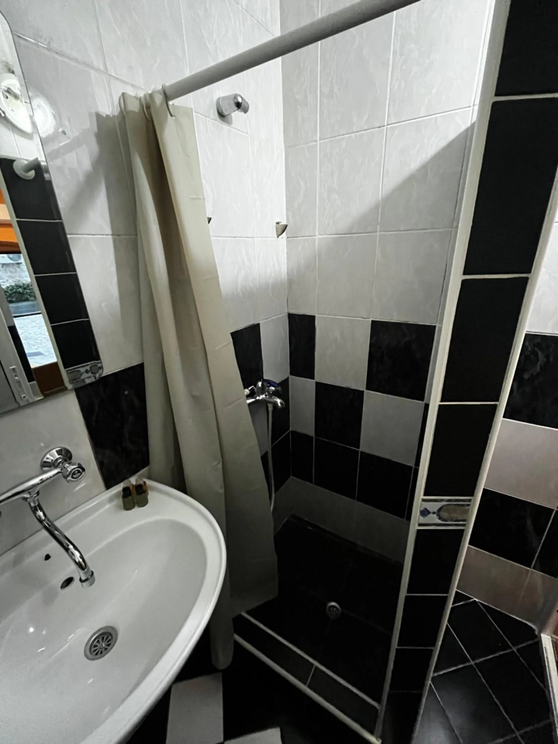 Shower in Puerta Apartments