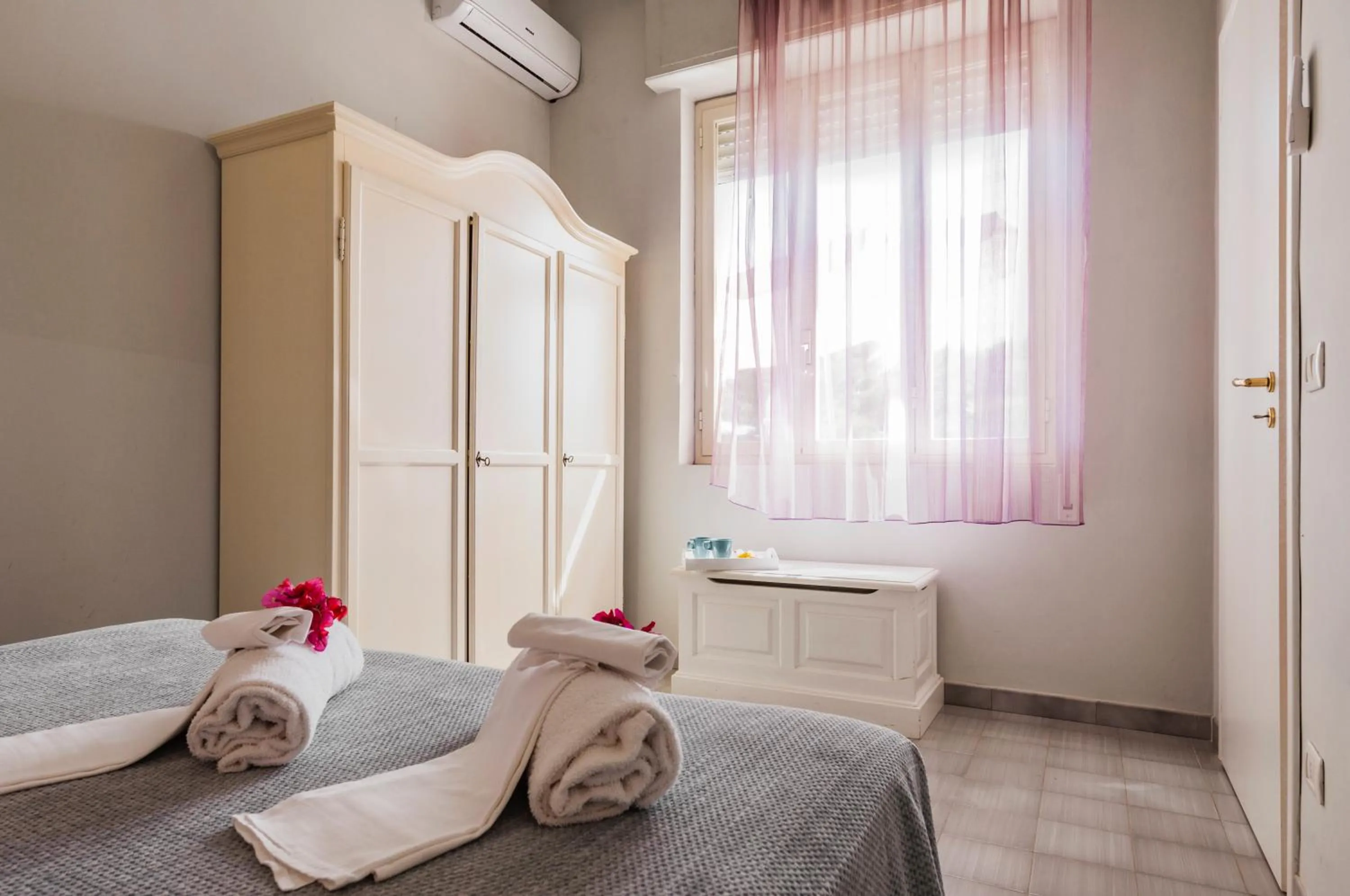 Bed in Stella del mare Apartments