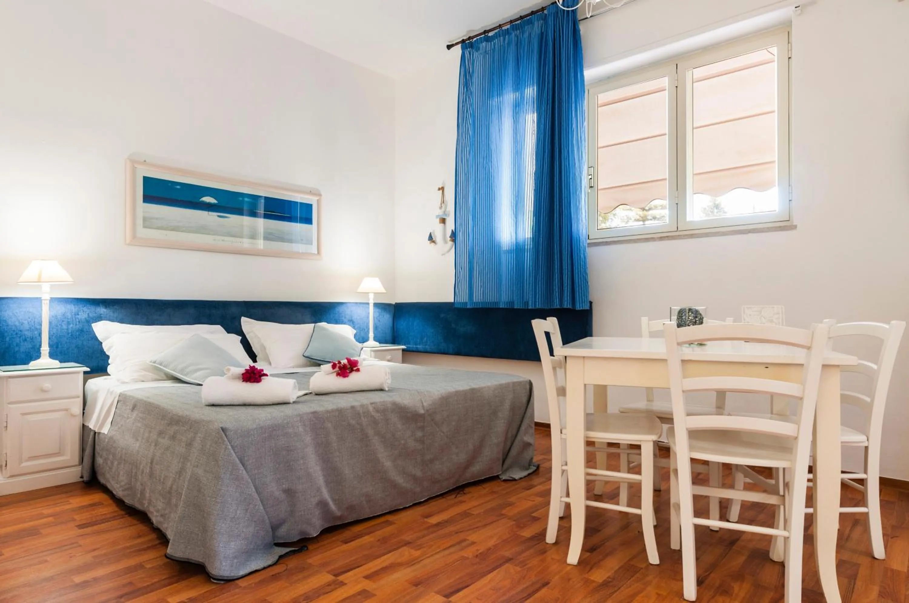 Bed in Stella del mare Apartments