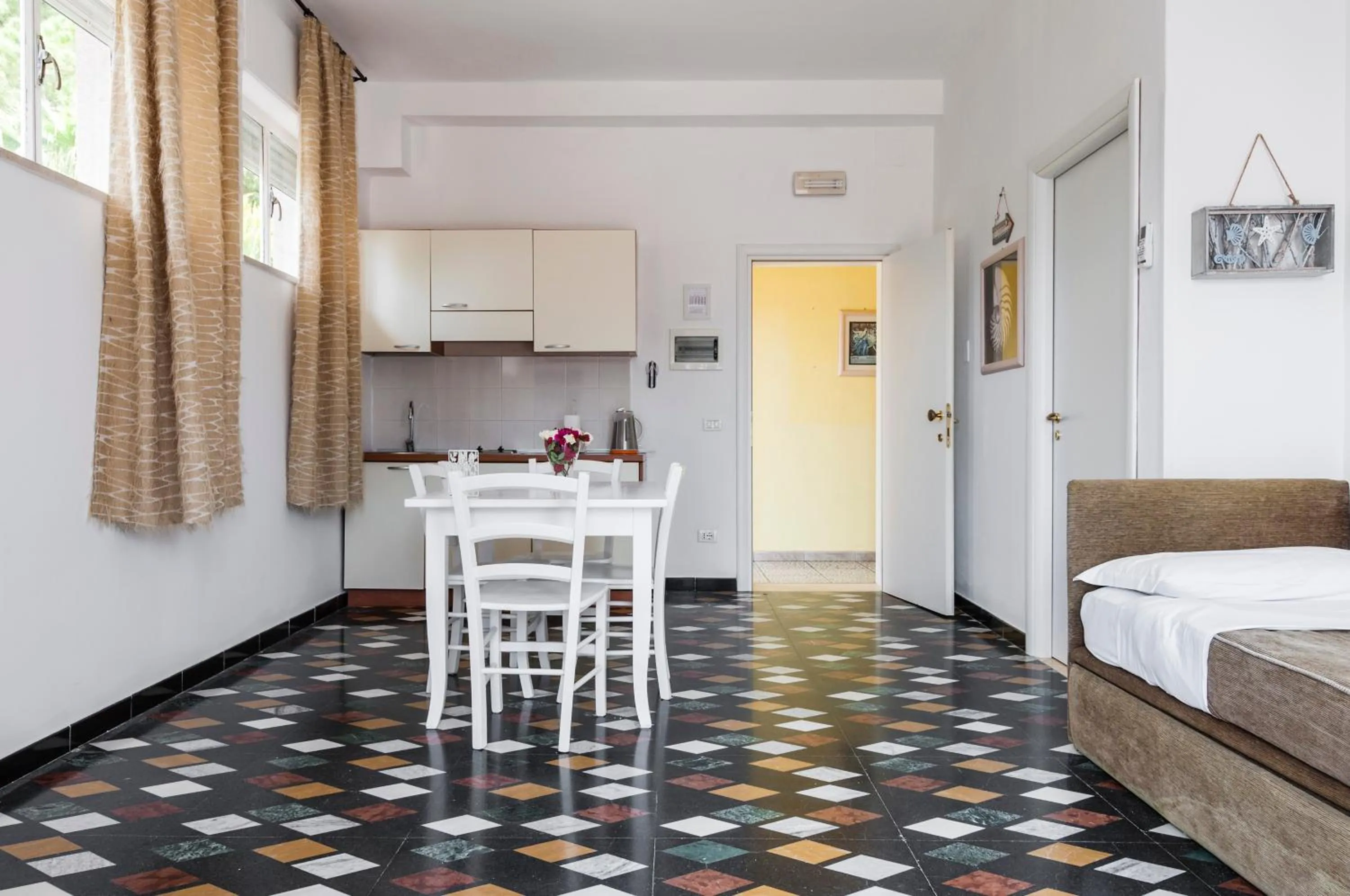 Bed in Stella del mare Apartments