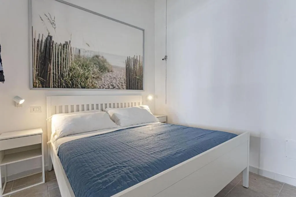 Bed in Stella del mare Apartments