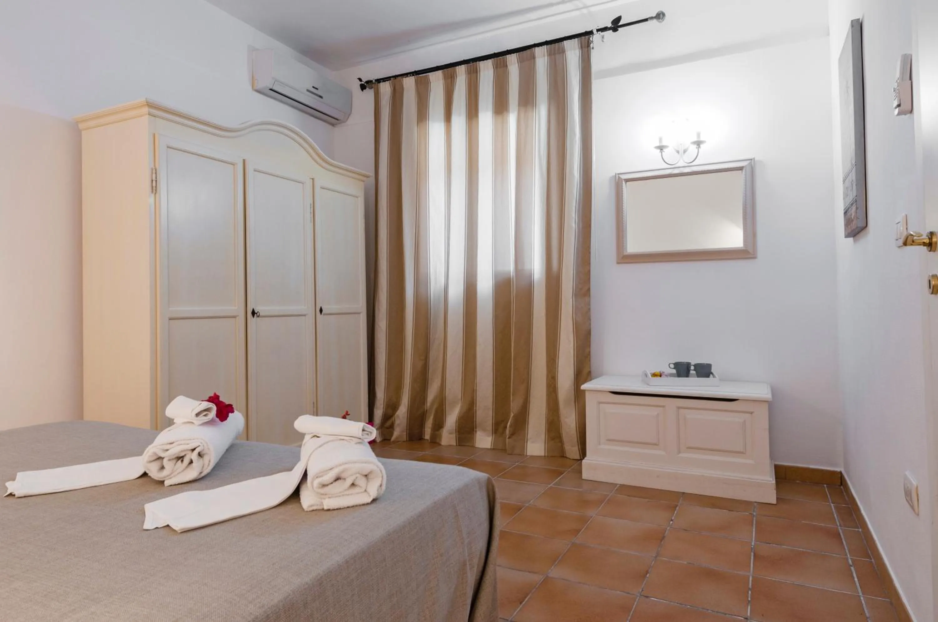 Bed in Stella del mare Apartments