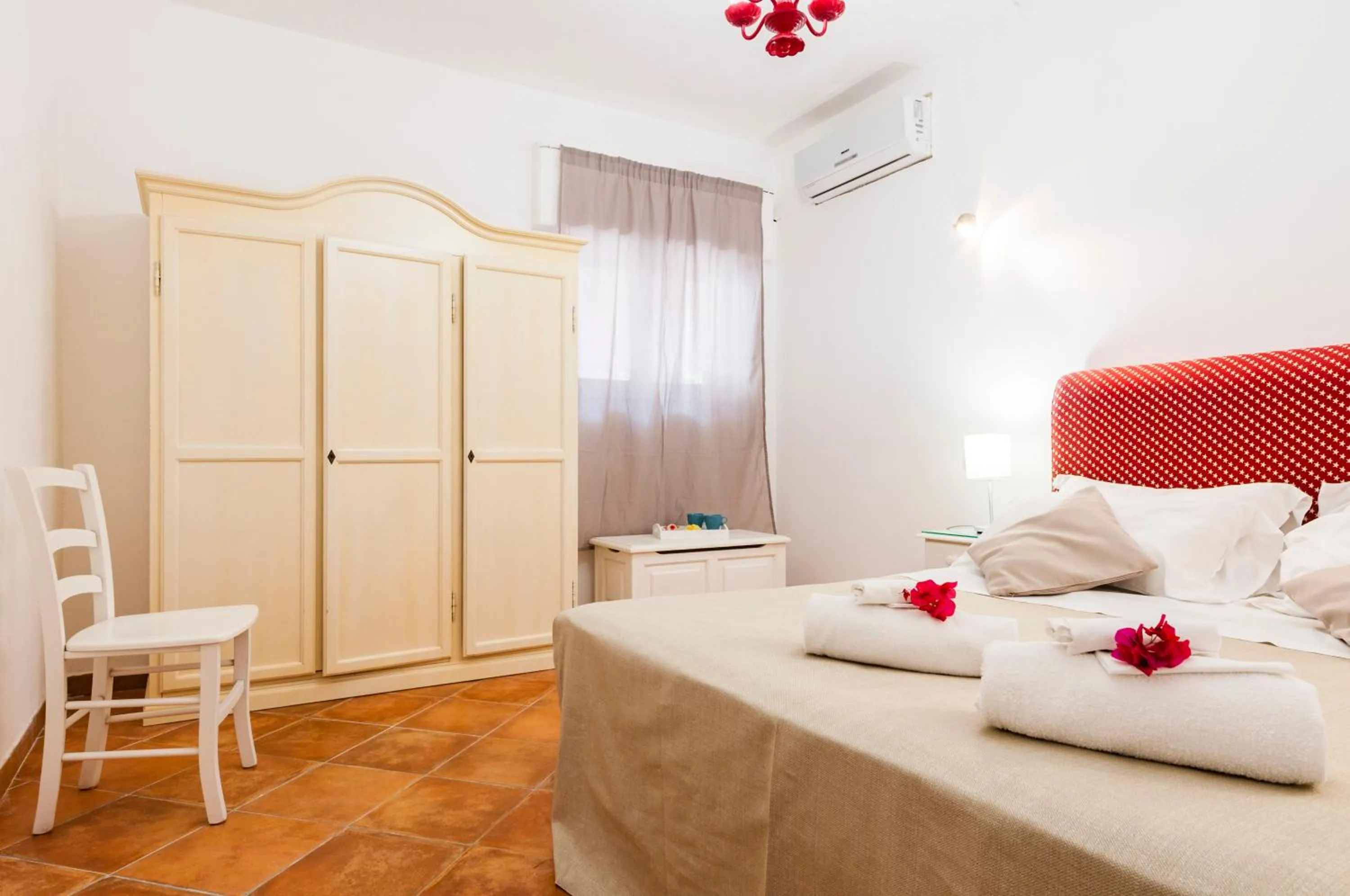 Bed in Stella del mare Apartments