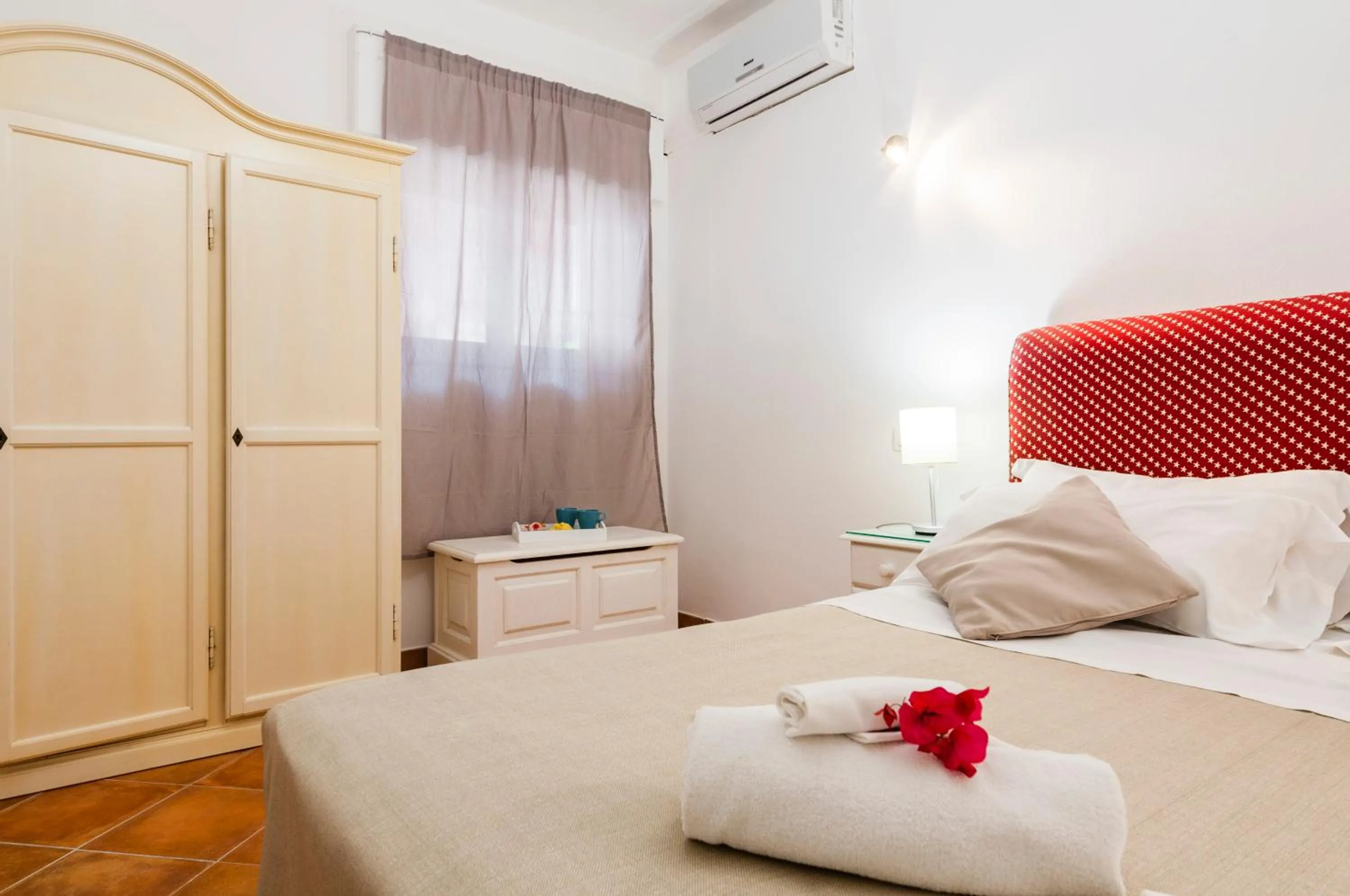 Bed in Stella del mare Apartments