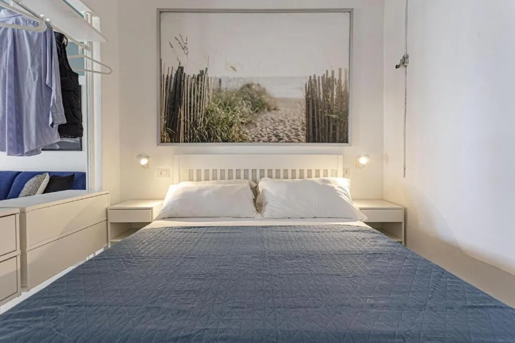 Bed in Stella del mare Apartments