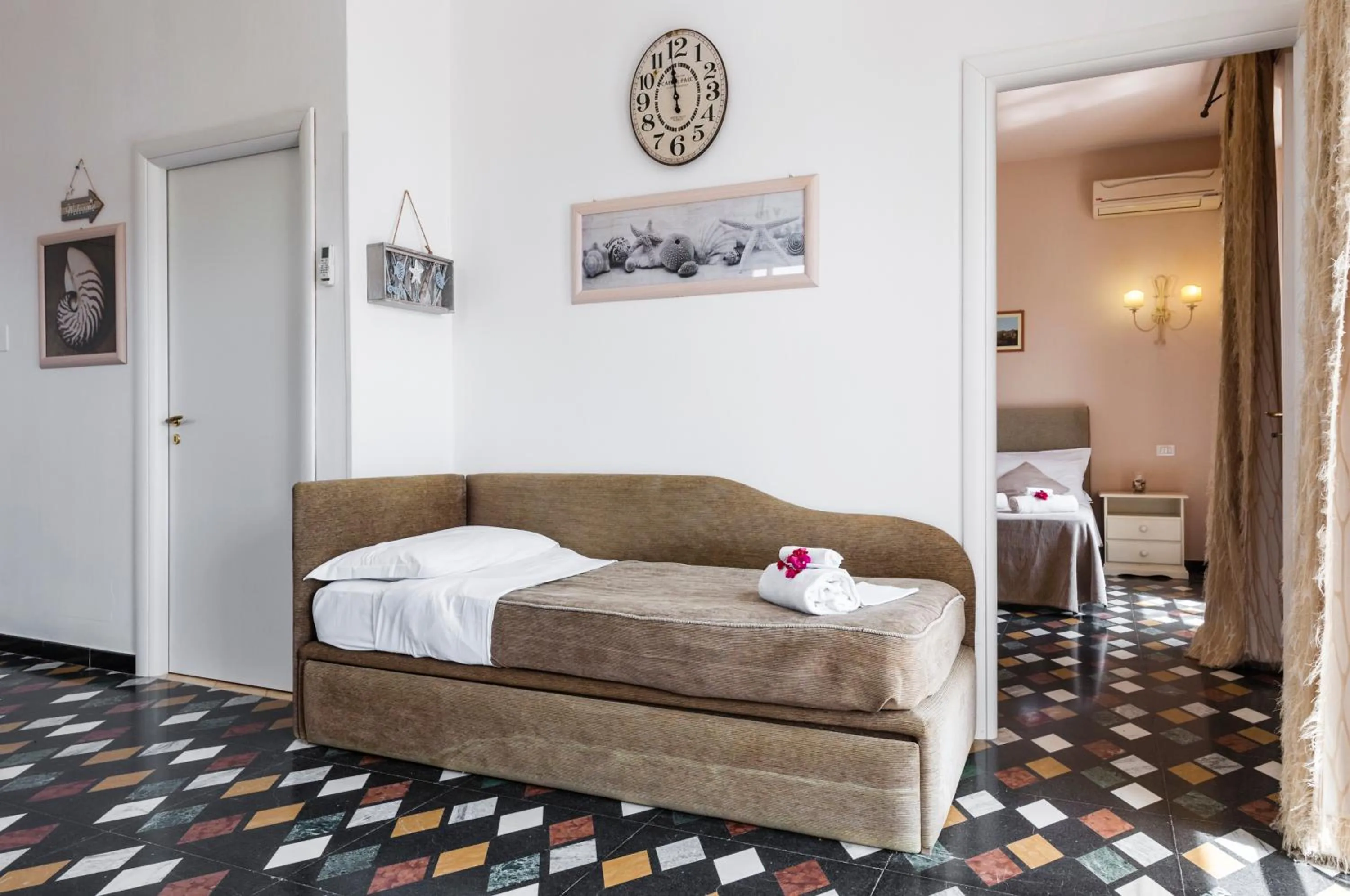 Bed in Stella del mare Apartments