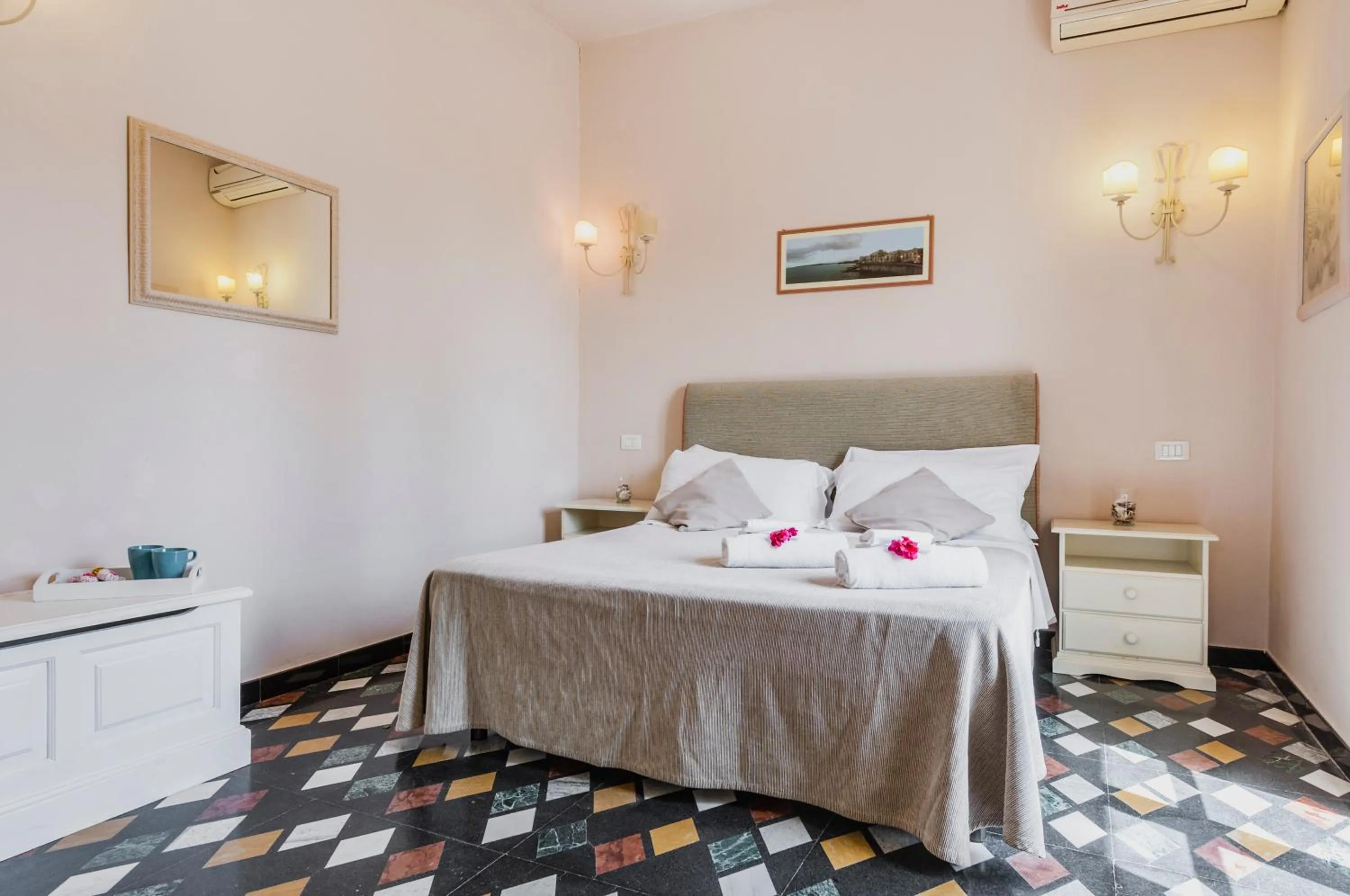 Bed in Stella del mare Apartments