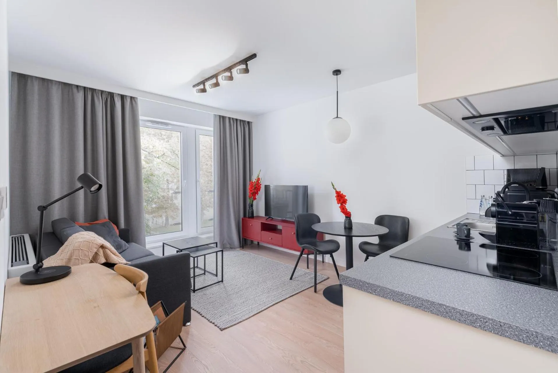 Living room in EXCLUSIVE Aparthotel Kraków Lubicz 40