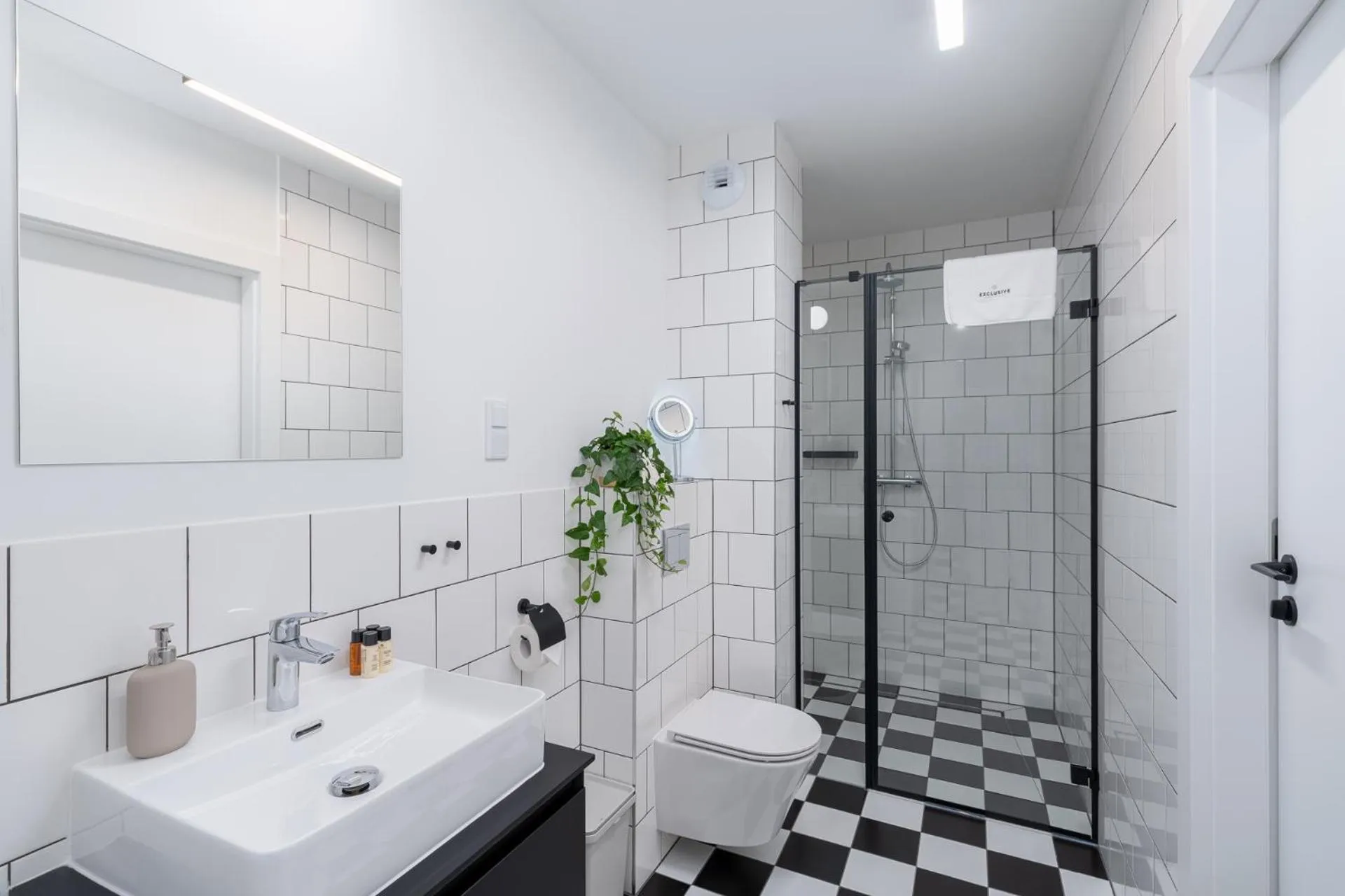 Bathroom in EXCLUSIVE Aparthotel Kraków Lubicz 40