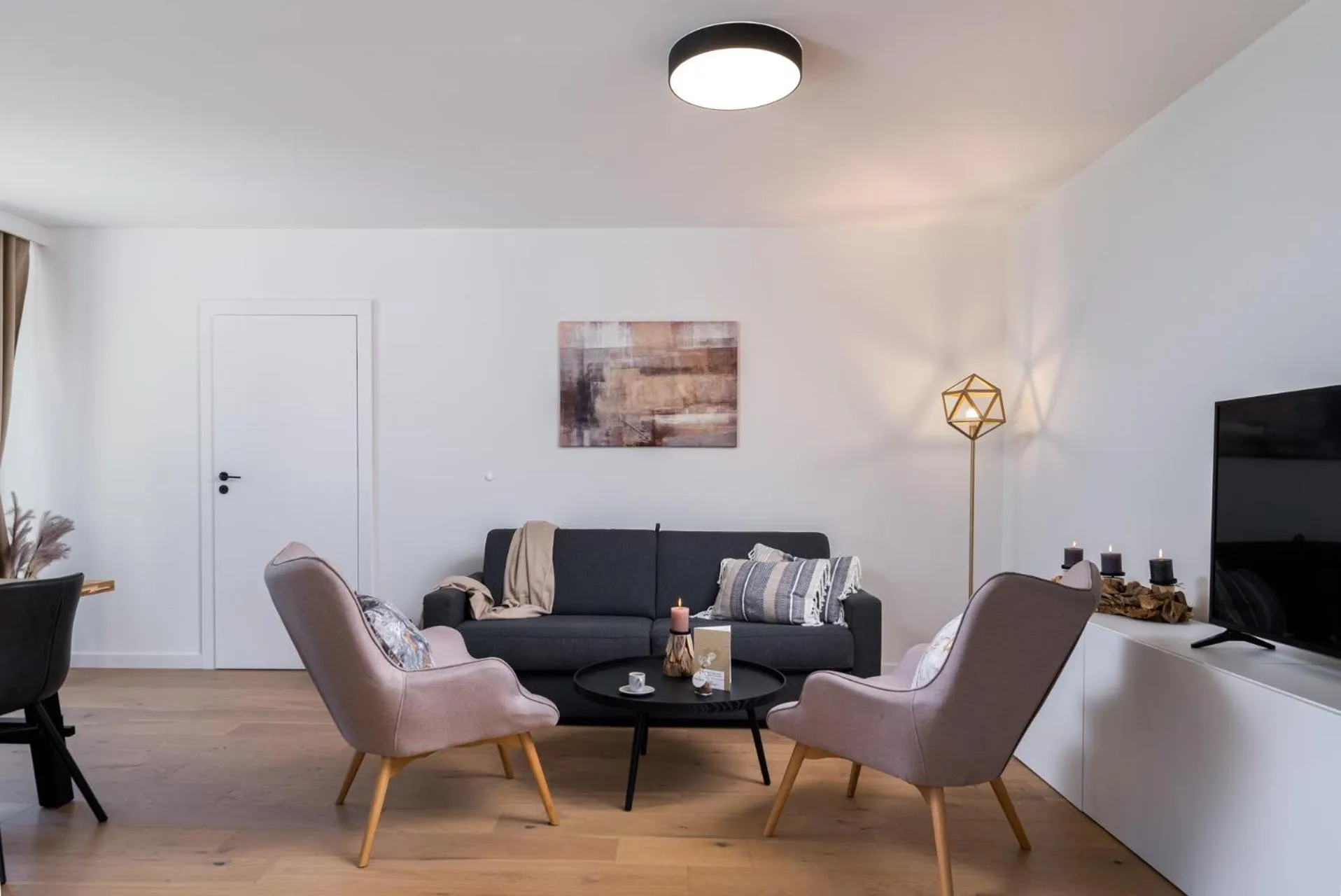 Living room in EXCLUSIVE Aparthotel Kraków Lubicz 40