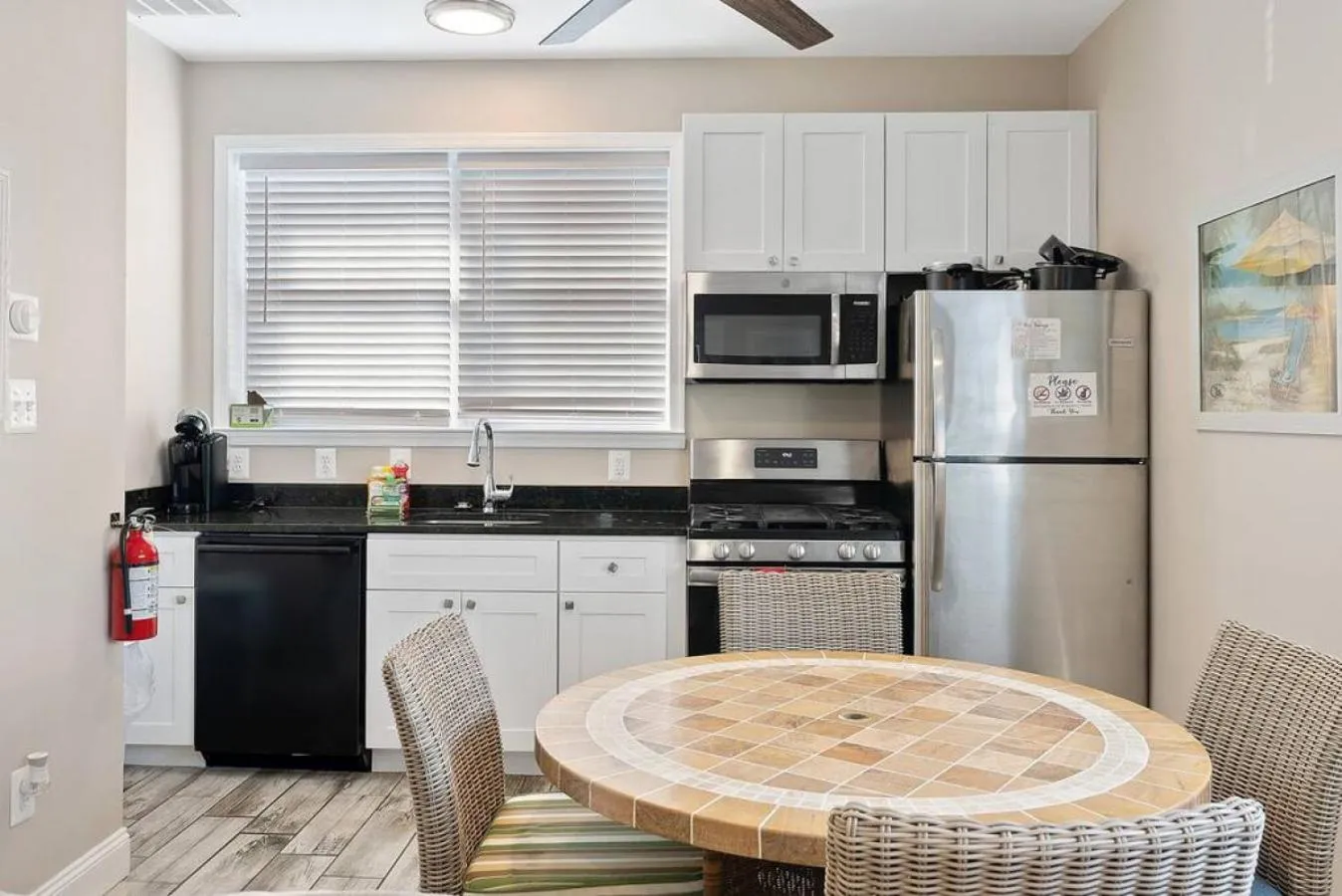 Dining area in Unit C back lower unit Surfers Hideway Parking Near Lighthouse