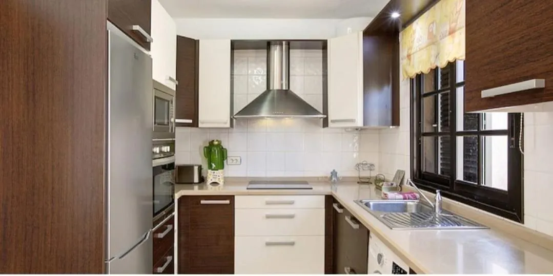 Kitchen or kitchenette in Residencial Maresia el Medano