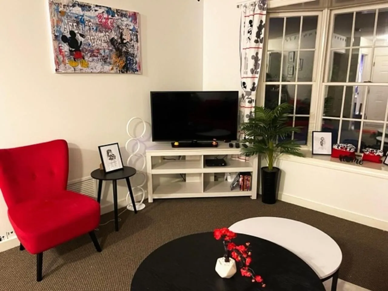 Communal lounge/ TV room in Disney Magic at Jiminy Mountain