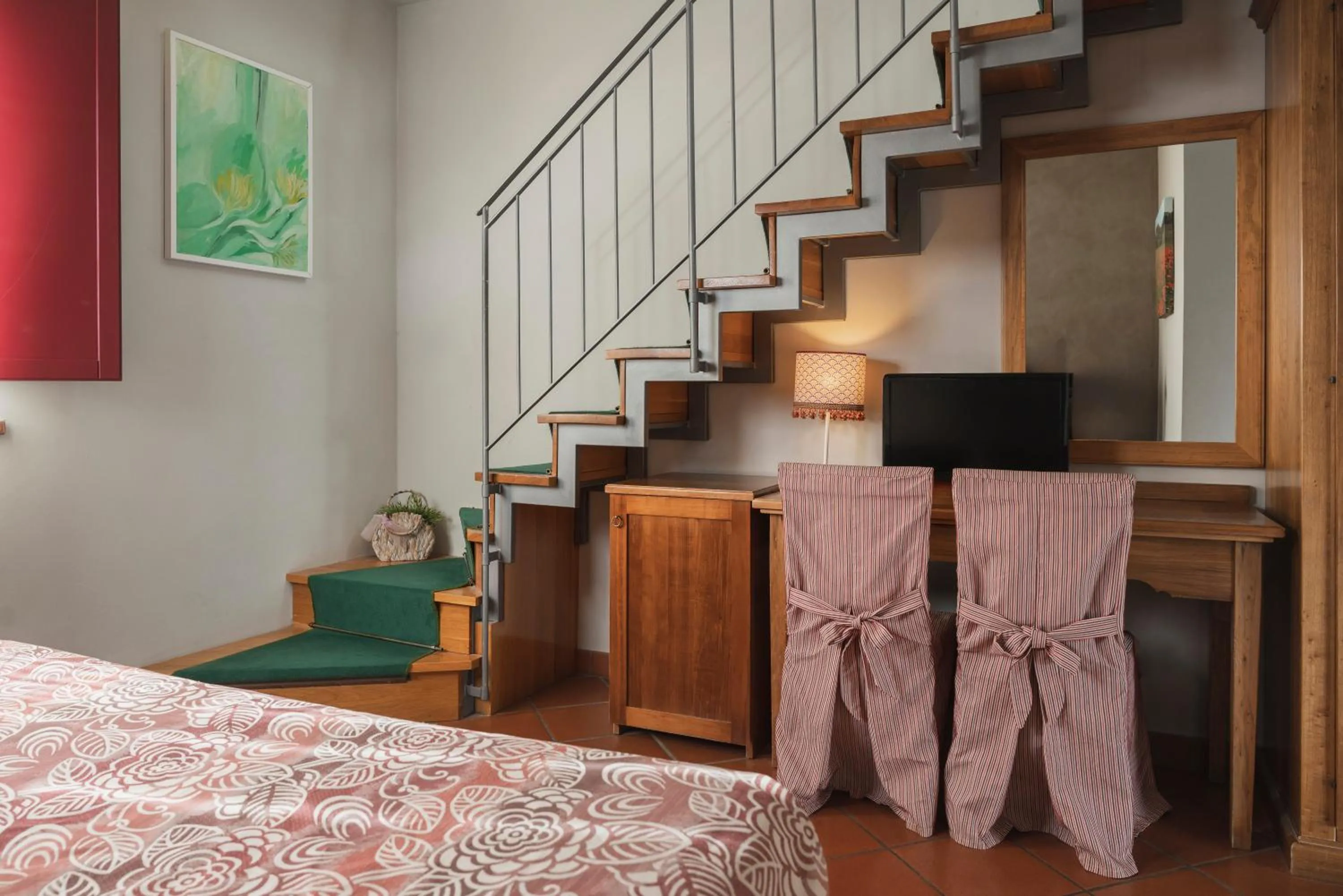 Photo of the whole room in Hotel & Restaurant Casolare Le Terre Rosse