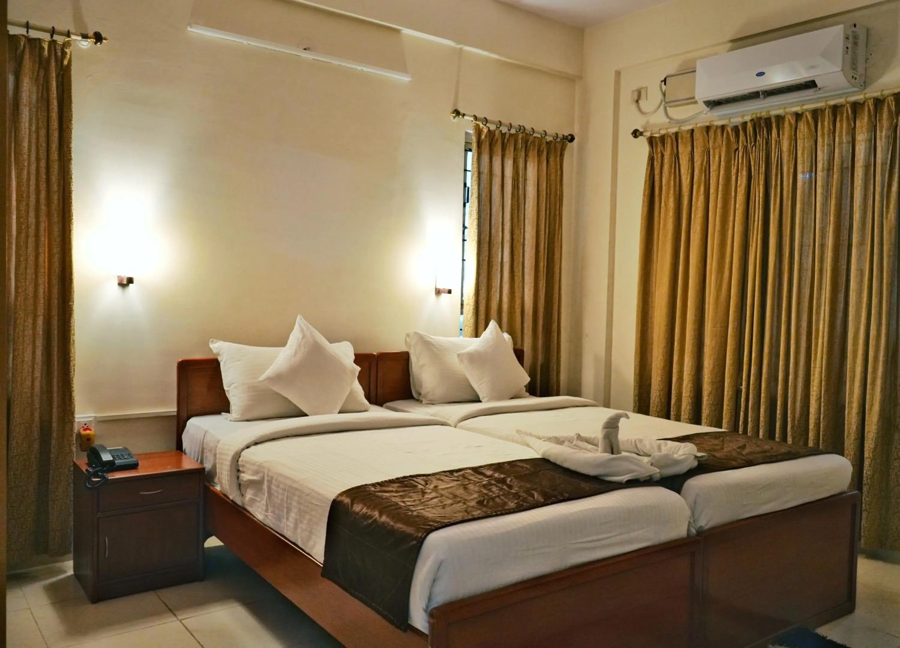 Bed in The Altruist Business Stays B-2