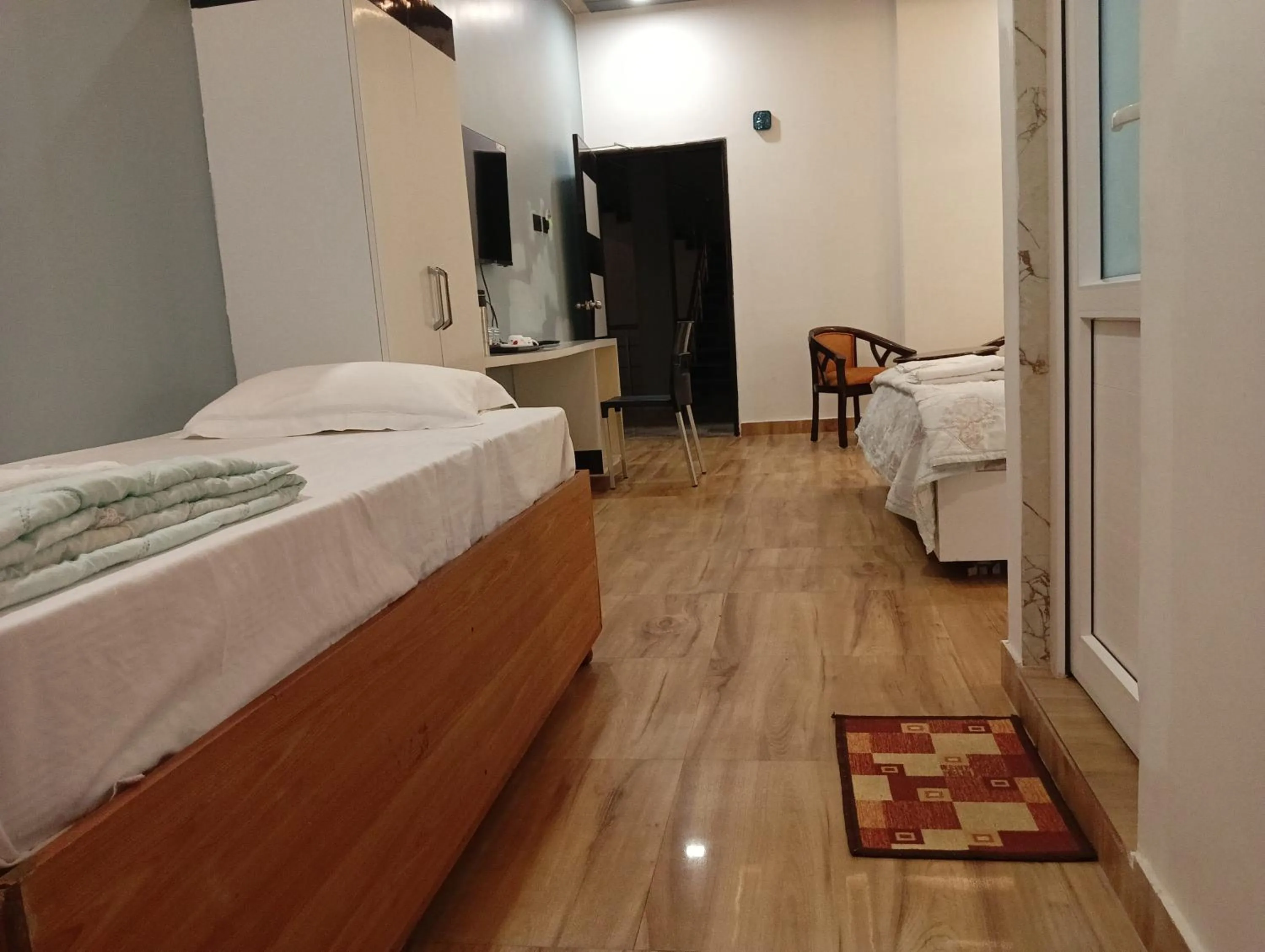 Photo of the whole room, Bed in Hotel Buddha Park near Sarnath, Varanasi