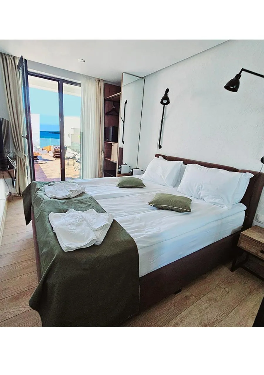 Bed in Olive Villas Beach Hotel