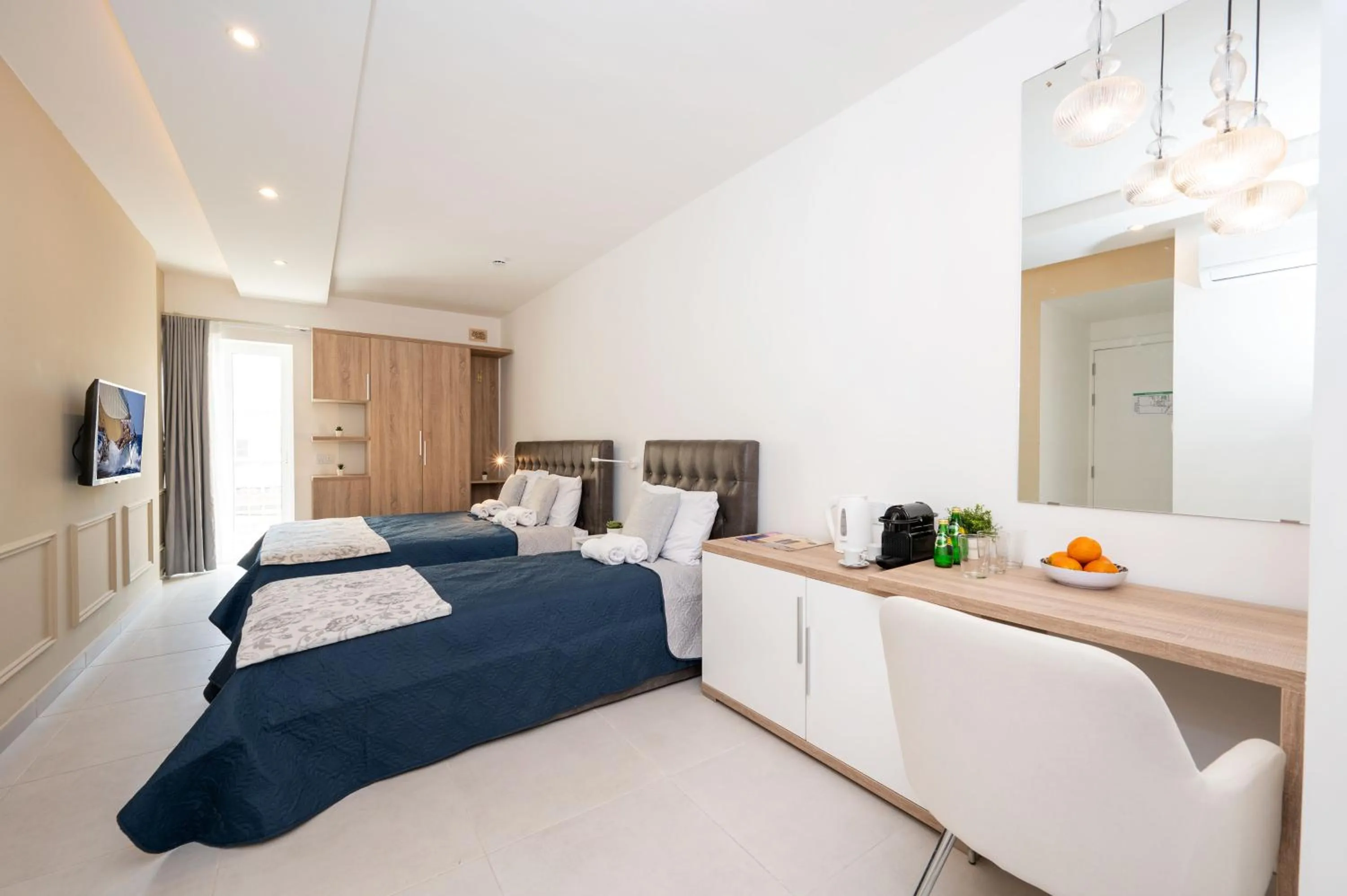 Photo of the whole room, Bed in Vela Blu Boutique Suites