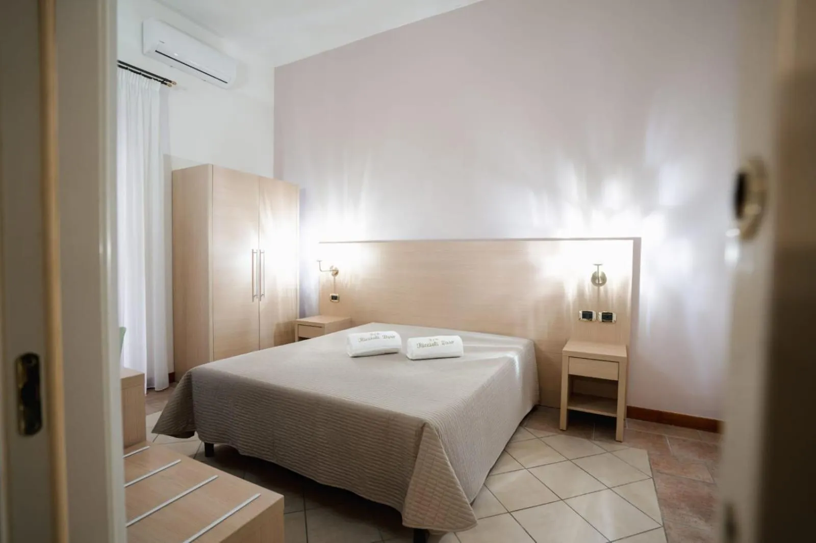 Bed in B&B Riccioli D'oro