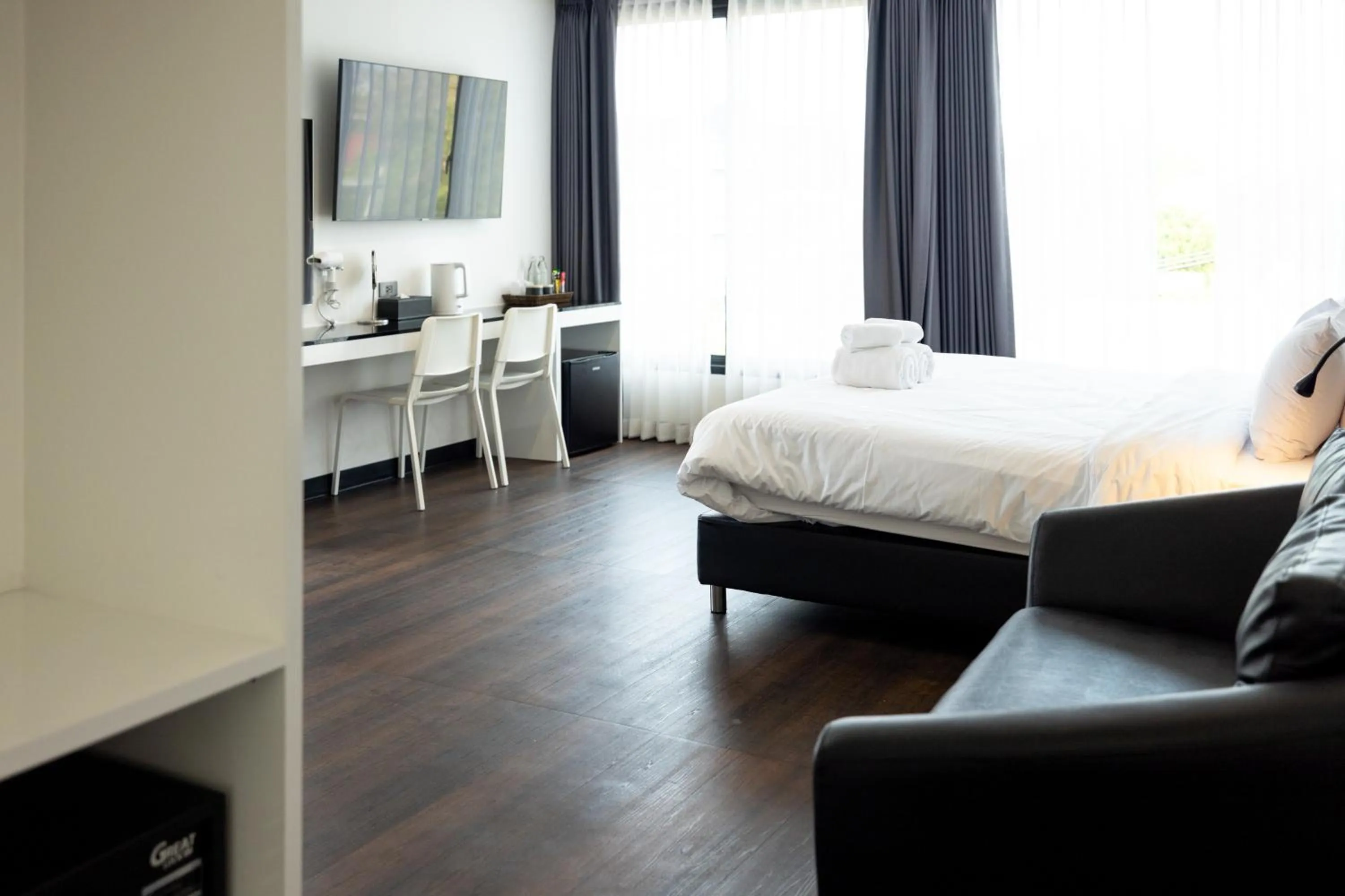 Photo of the whole room, Bed in NANEE Phra Singh