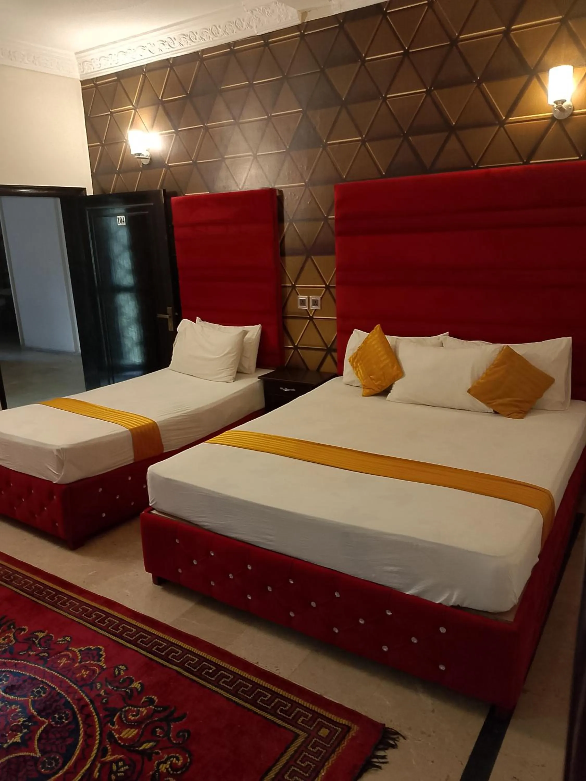 Bed in Hotel Royal Grand