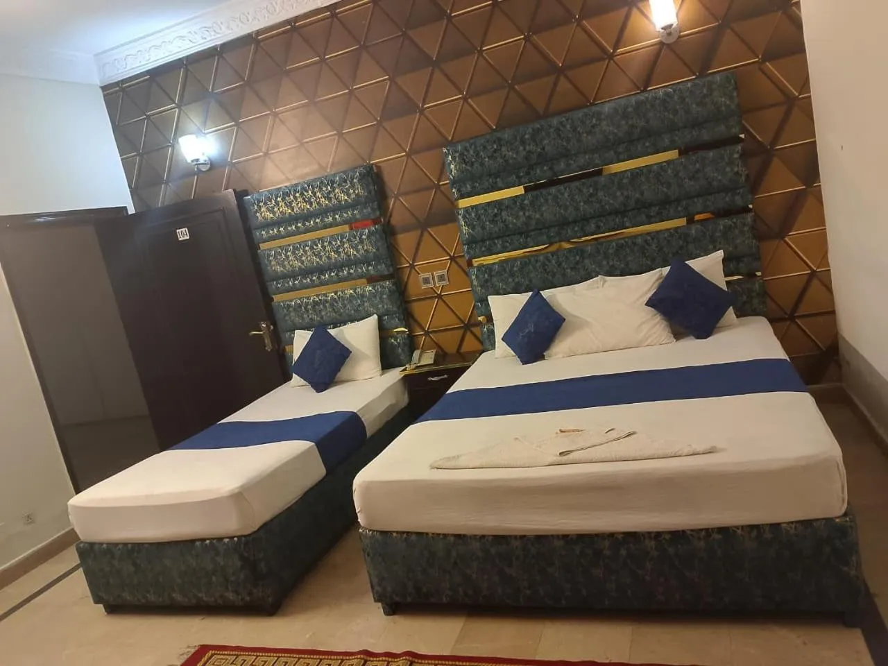 Bed in Hotel Royal Grand