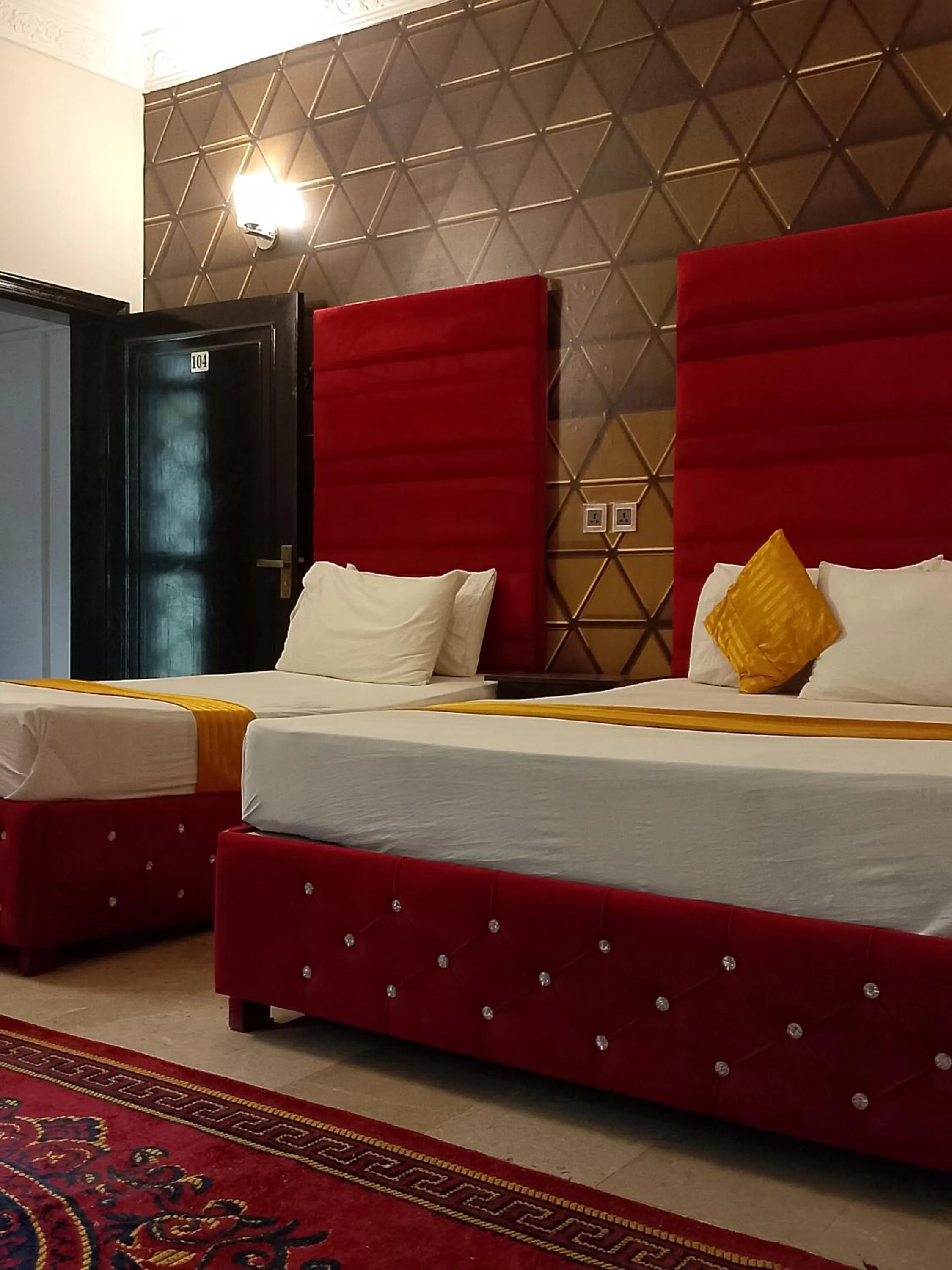 Bed in Hotel Royal Grand