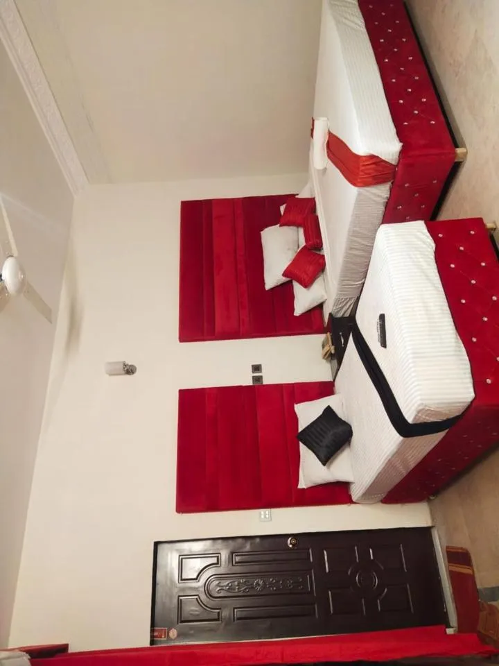 Bed in Hotel Royal Grand