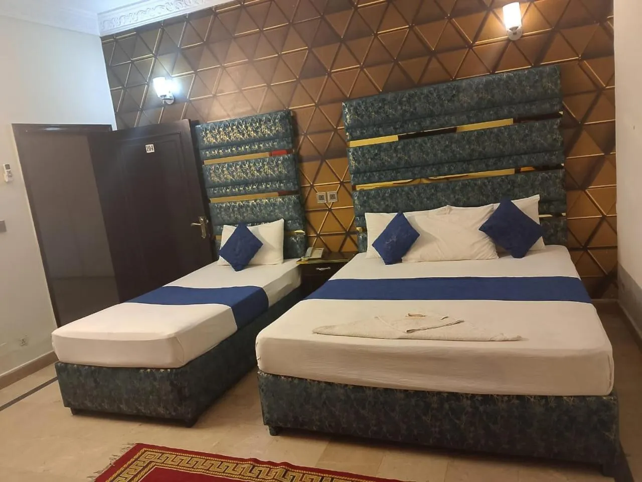 Bed in Hotel Royal Grand