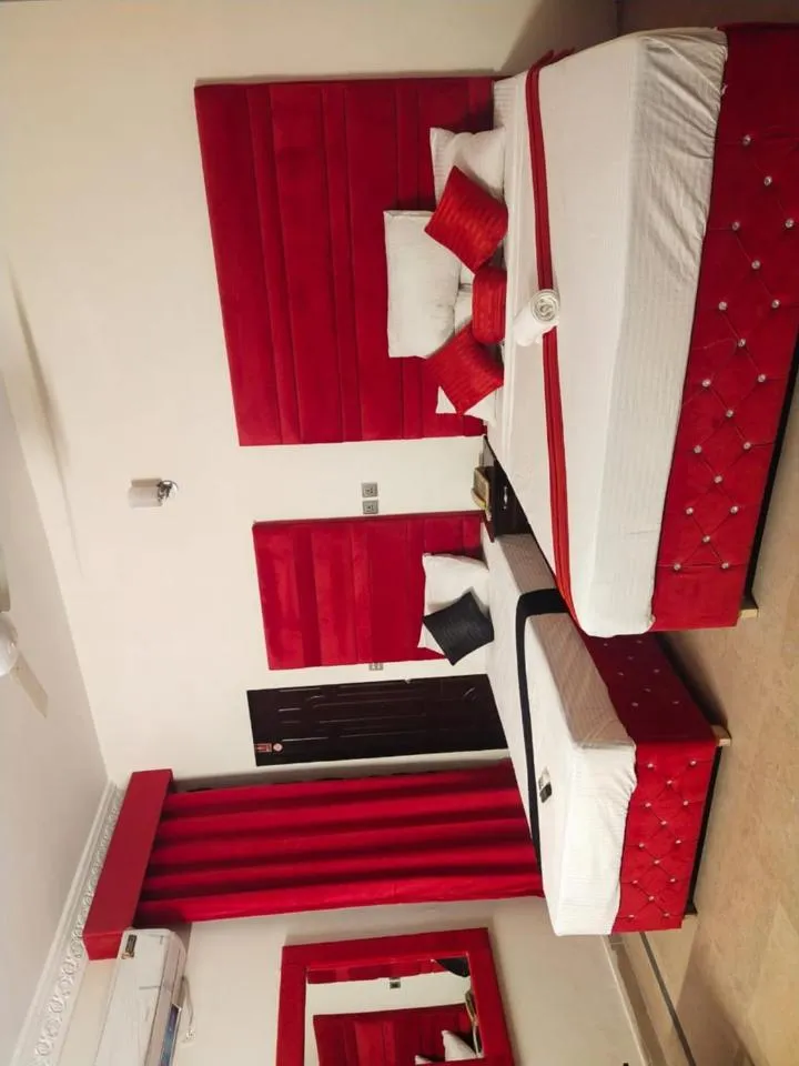 Bed in Hotel Royal Grand