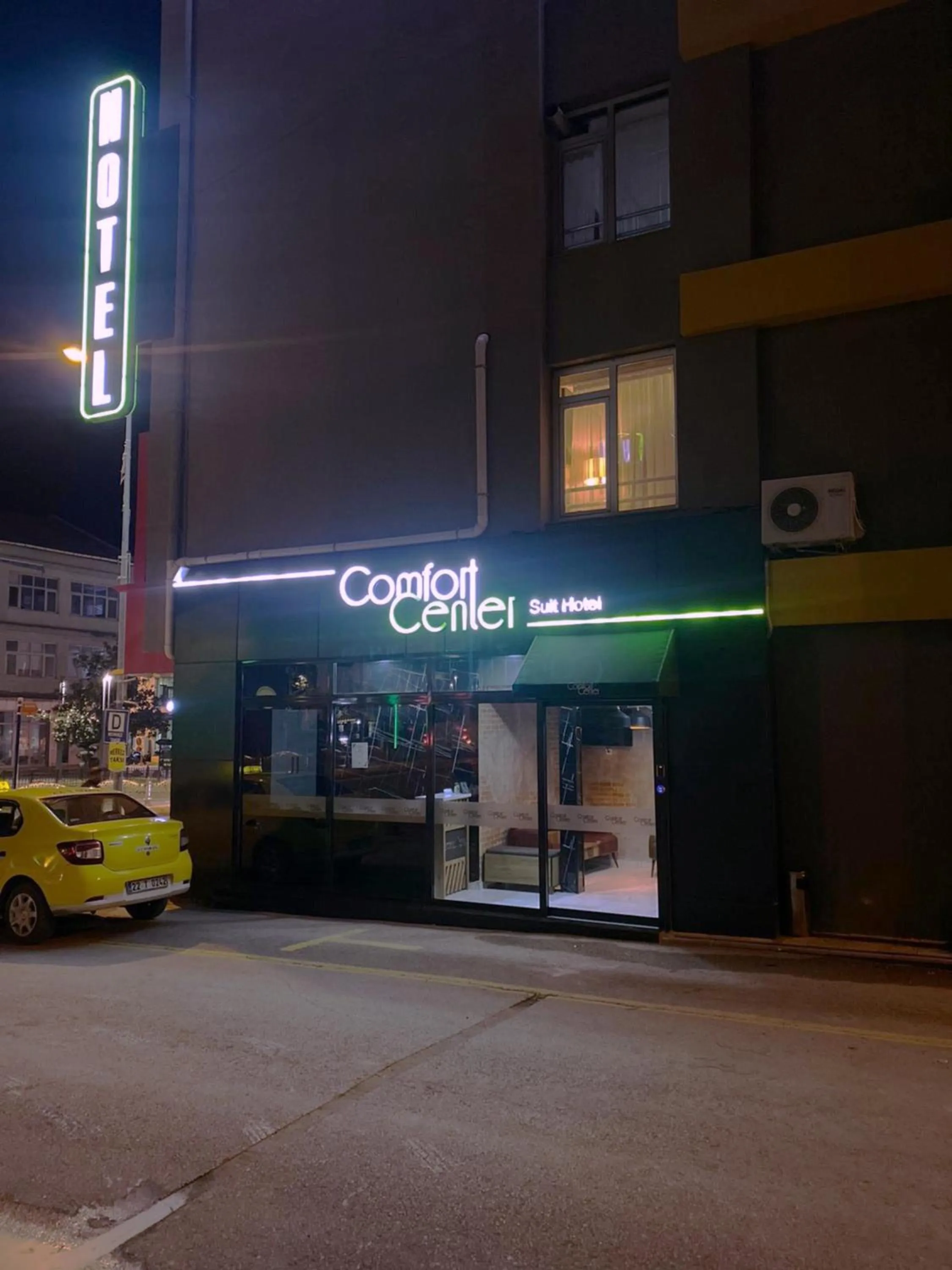 Property building in Comfort Center Suit Hotel